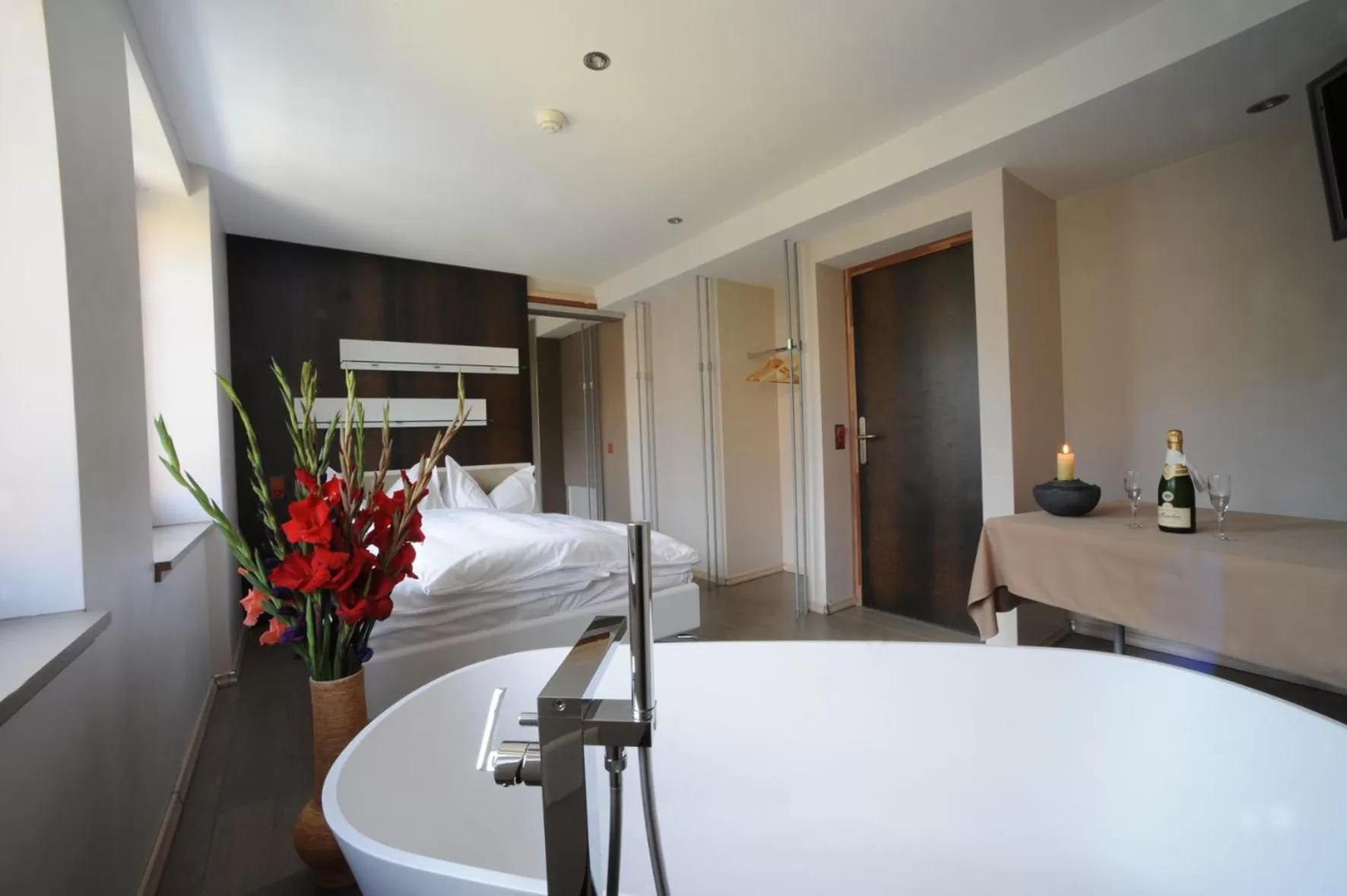 Bed in Chez Gilles hôtel resto bar SA