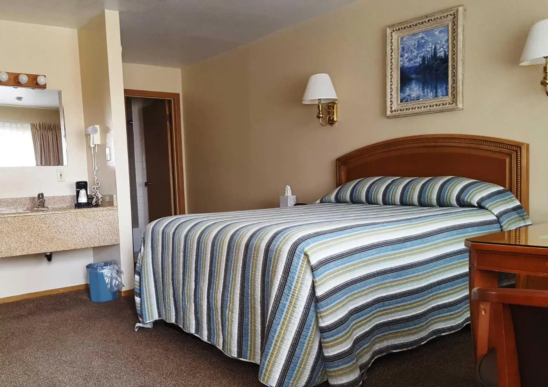 Bed in Bristlecone Motel