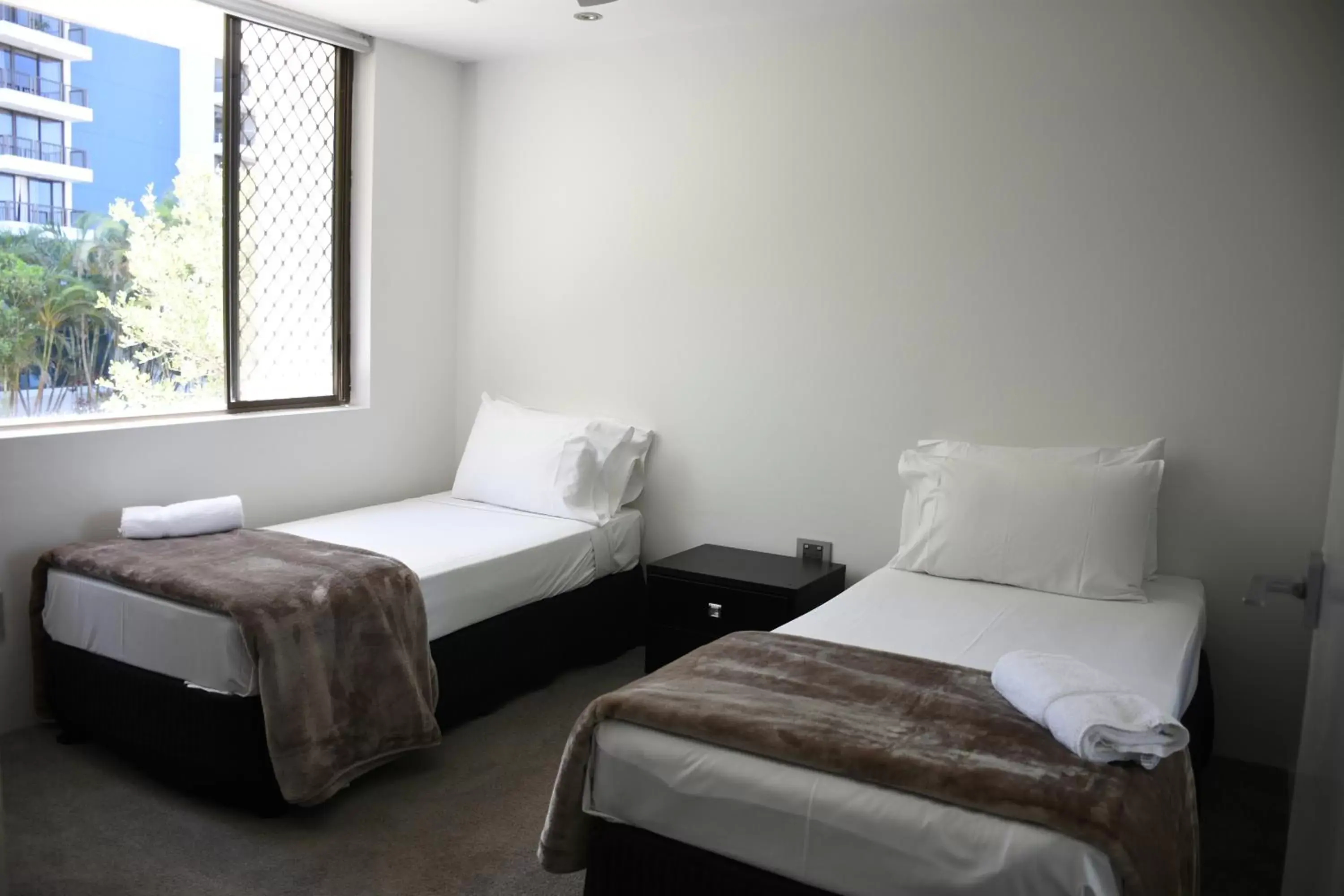 Bed in Copacabana Apartments