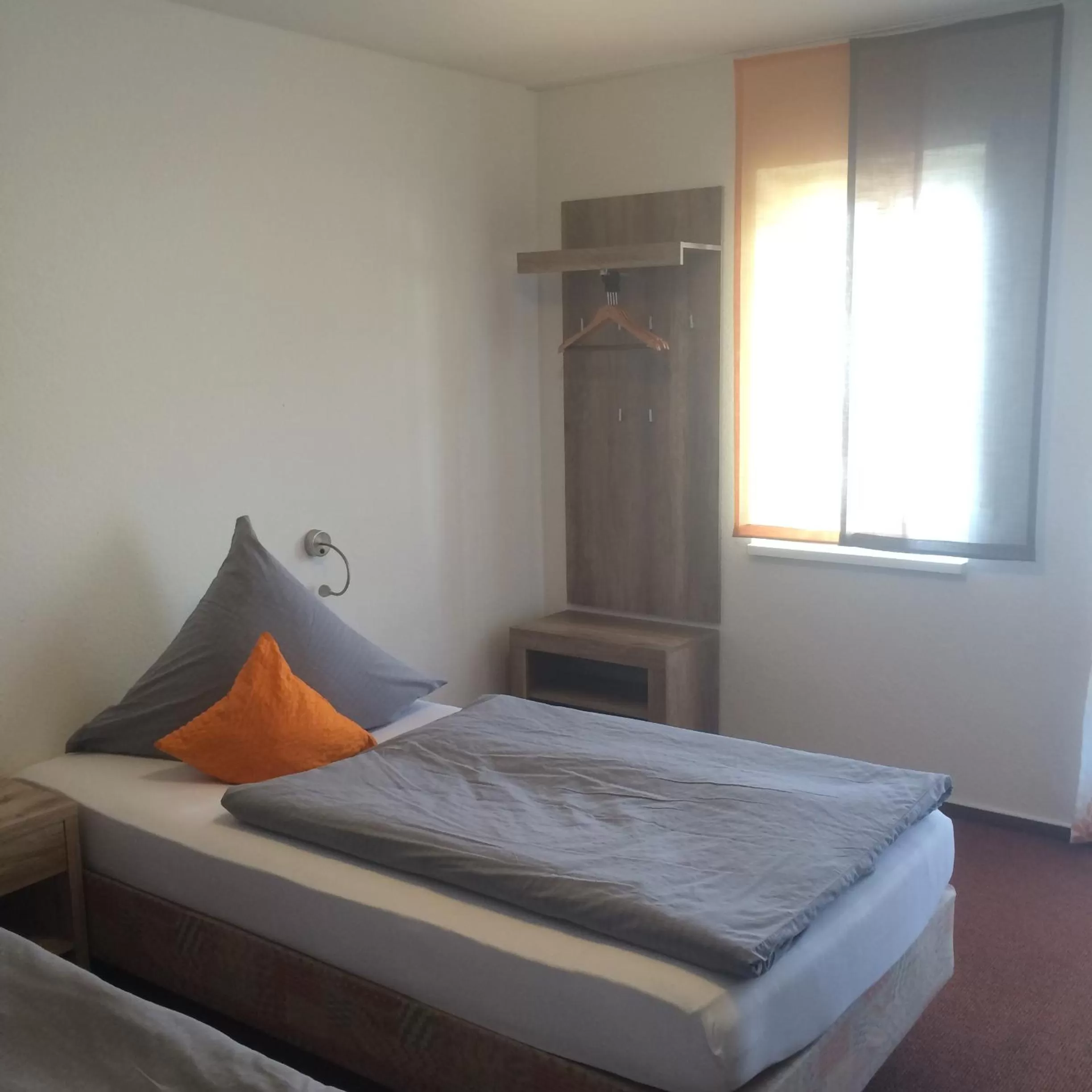 Photo of the whole room, Bed in Hotel Astra Rastatt