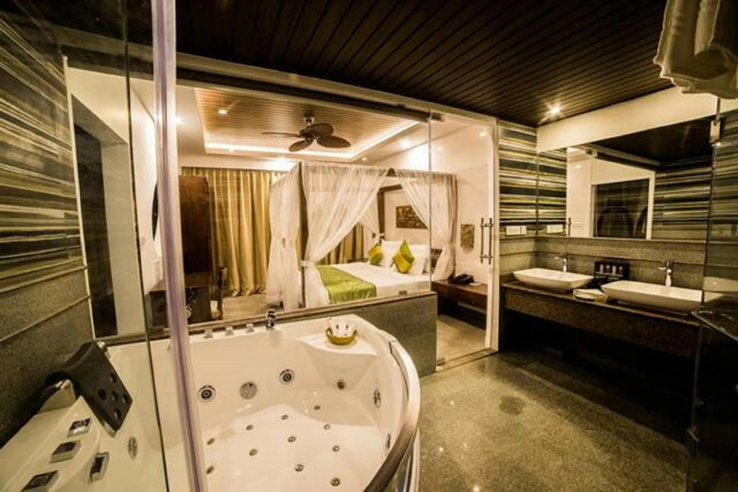 Bed in Elixir Hills Suites Resort and Spa