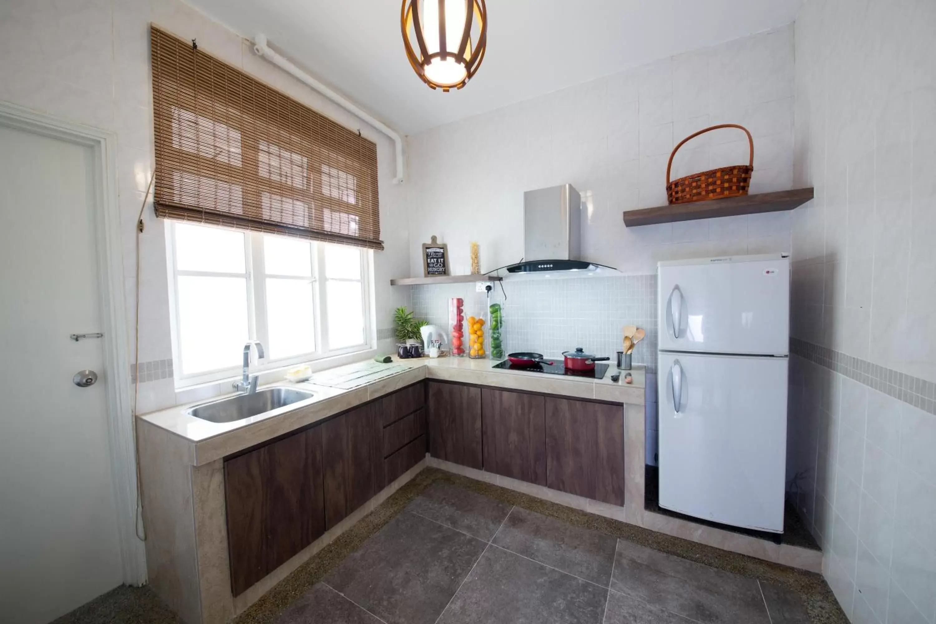 Kitchen/Kitchenette in Ancasa Residences, Port Dickson by Ancasa Hotels & Resorts