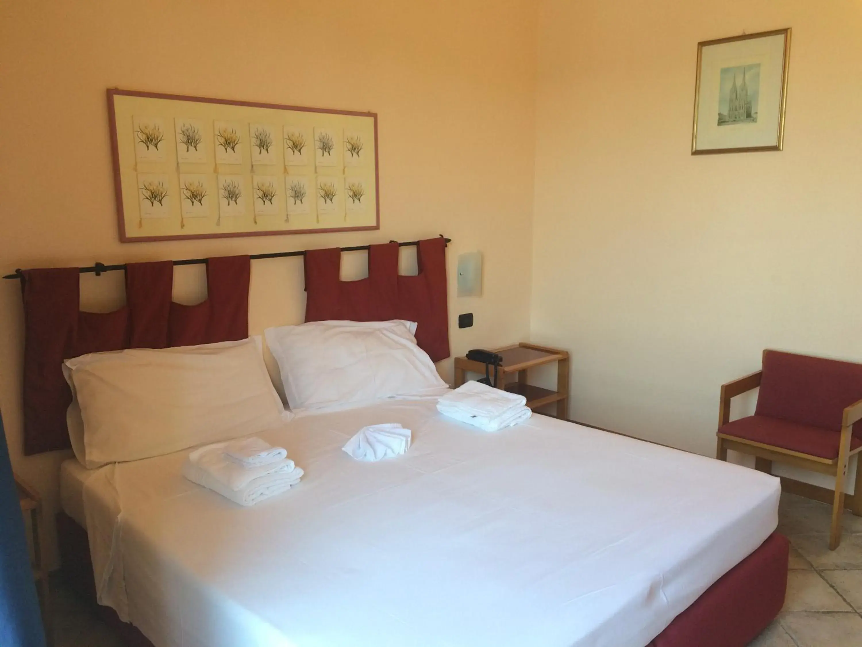 Bed in Hotel Miramare