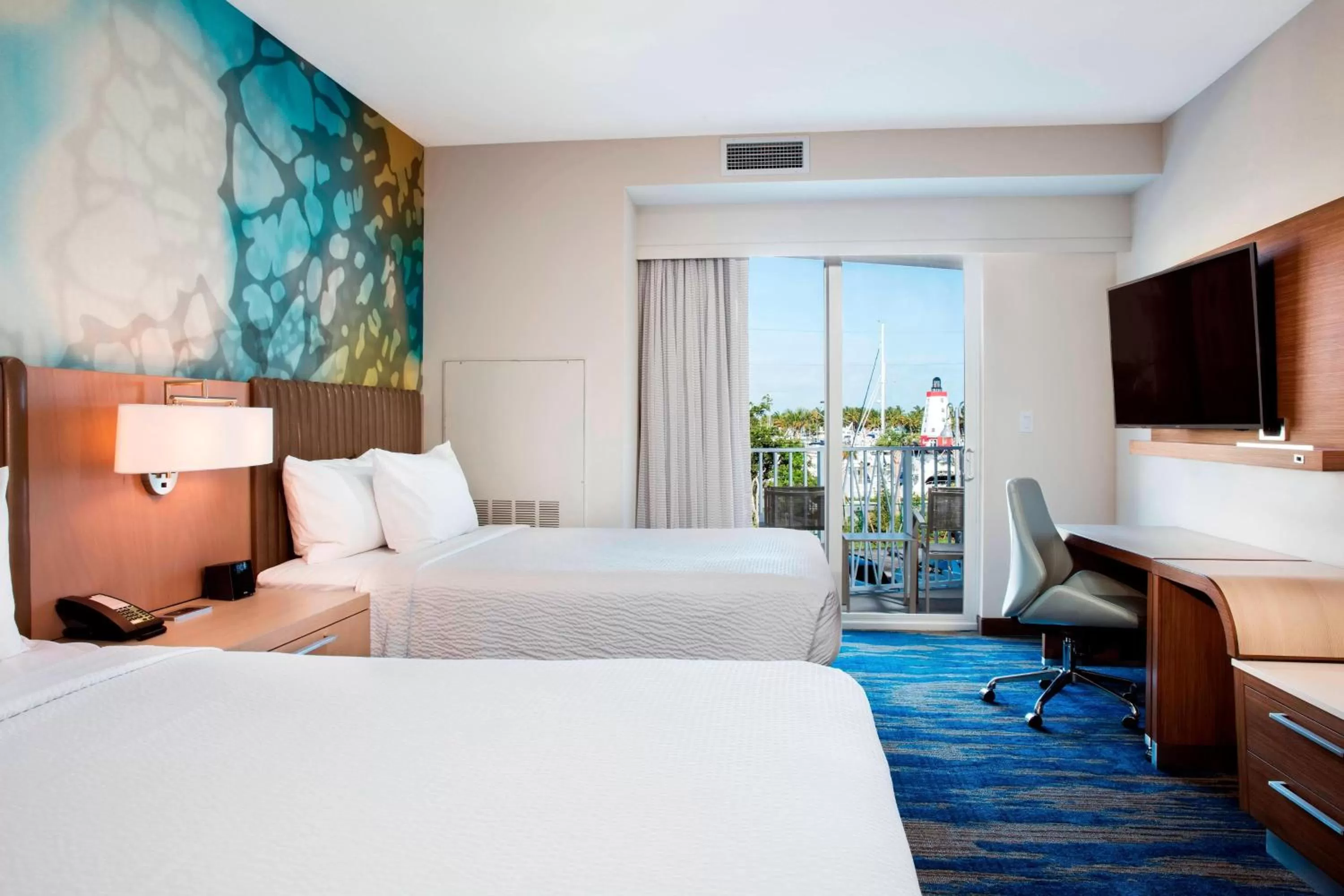 Photo of the whole room, Bed in Courtyard by Marriott Faro Blanco Resort