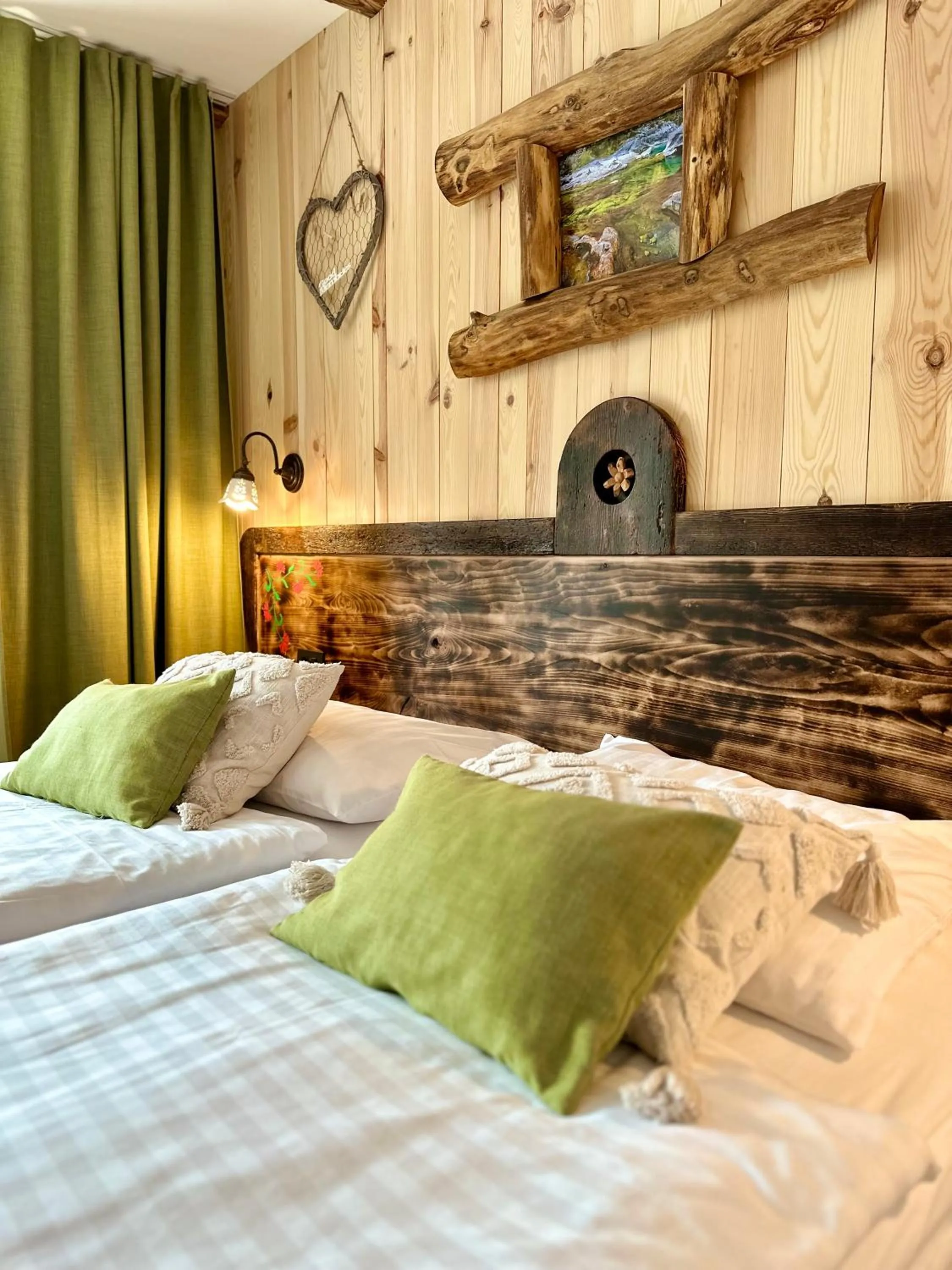 Bed in Ribno Alpine Hotel