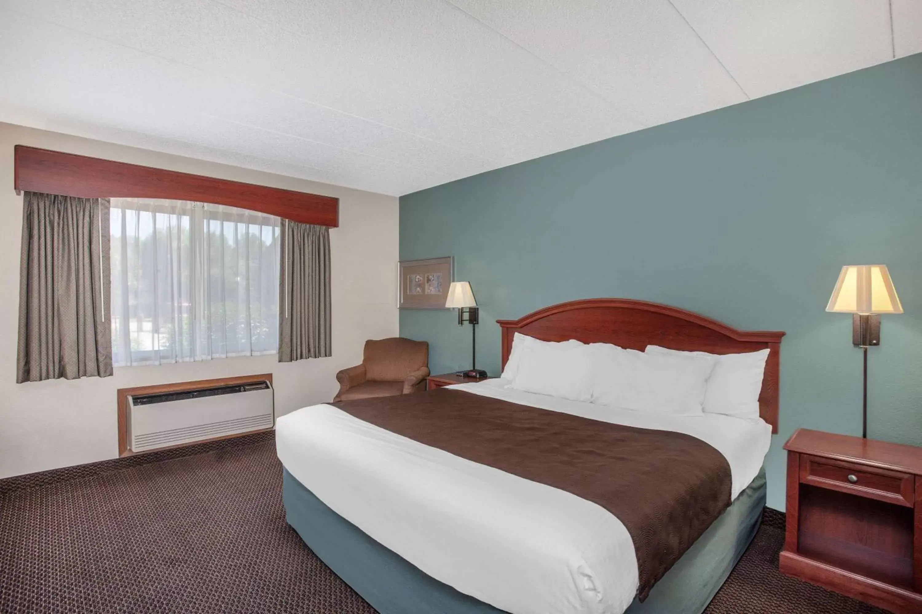 Photo of the whole room, Bed in AmericInn by Wyndham St. Peter