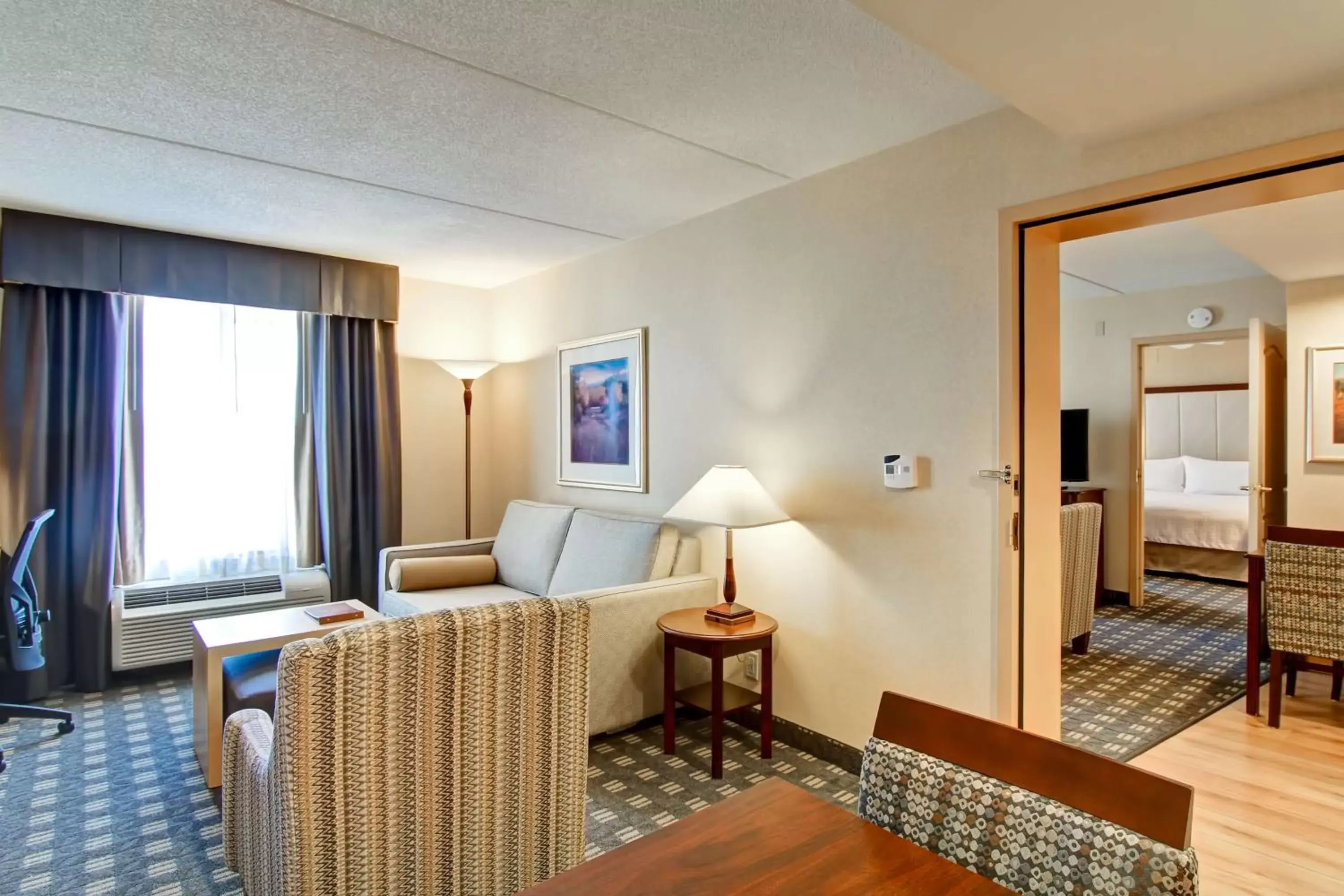 Bedroom, Seating Area in Homewood Suites by Hilton Toronto-Mississauga