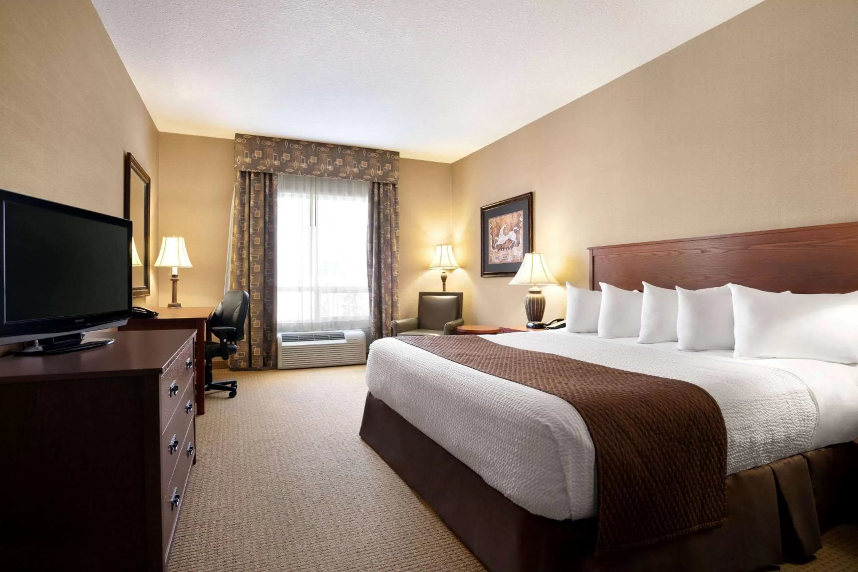 Photo of the whole room, Bed in Days Inn & Suites by Wyndham Strathmore