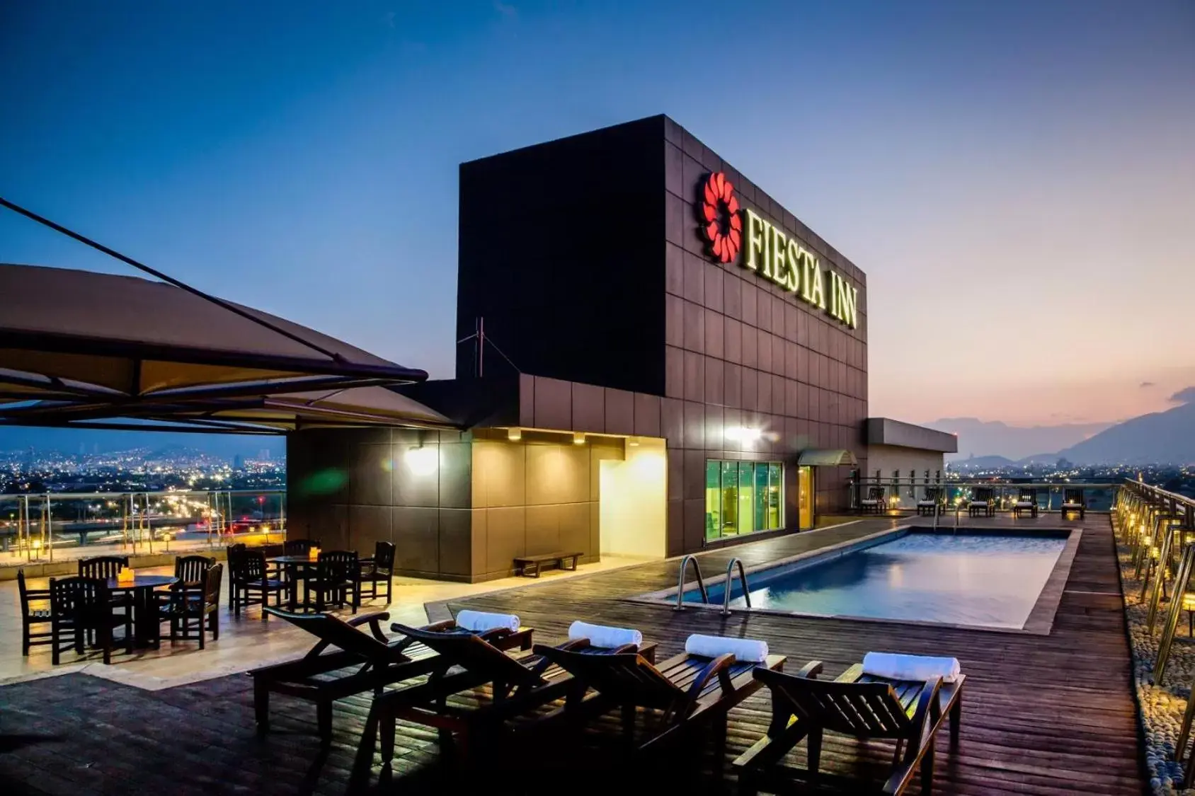 Balcony/Terrace, Swimming Pool in Fiesta Inn Monterrey Fundidora