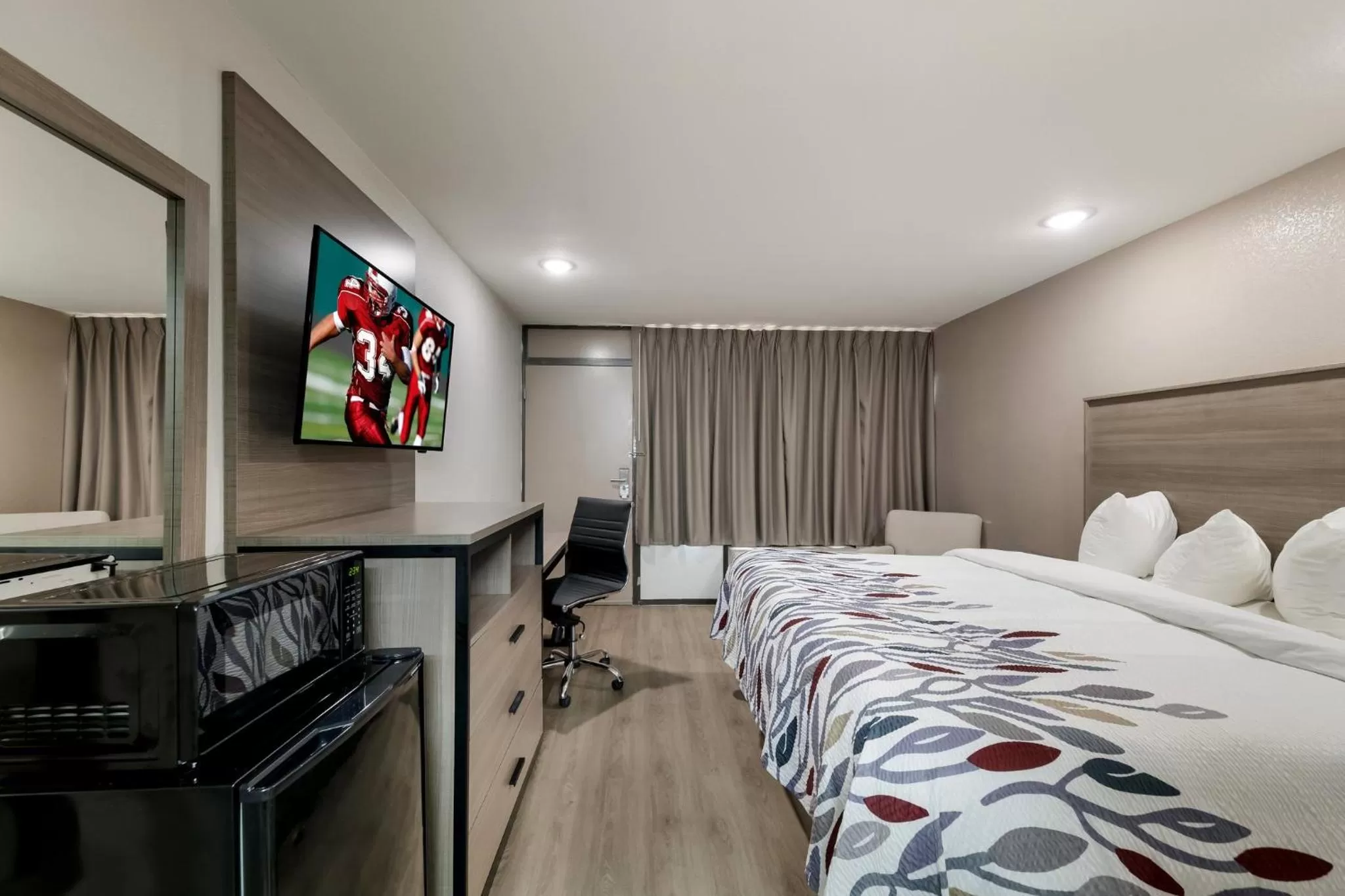 Photo of the whole room, Bed in Red Roof Inn & Conference Center McKinney