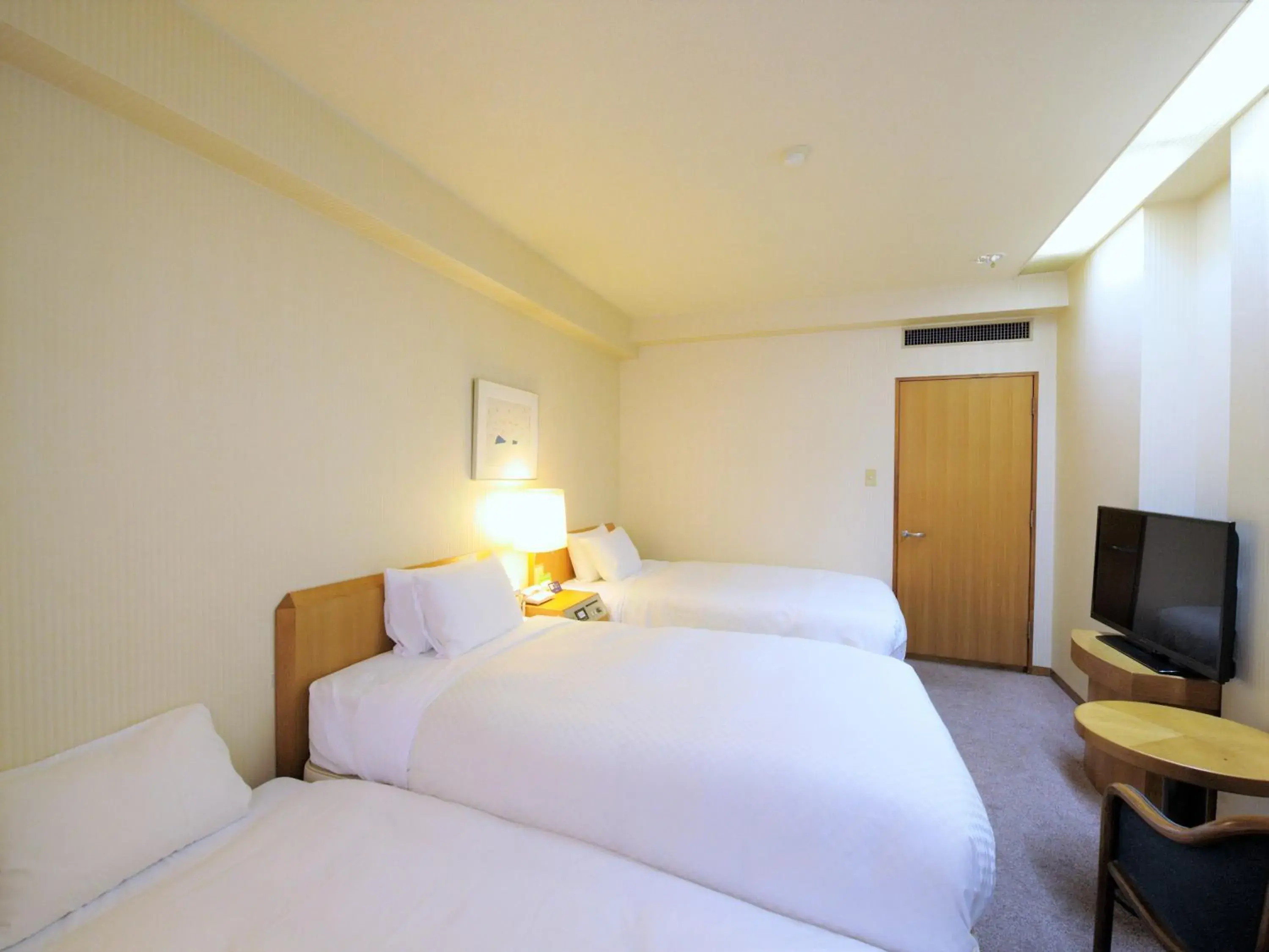 Bed in Court Hotel Fukuoka Tenjin