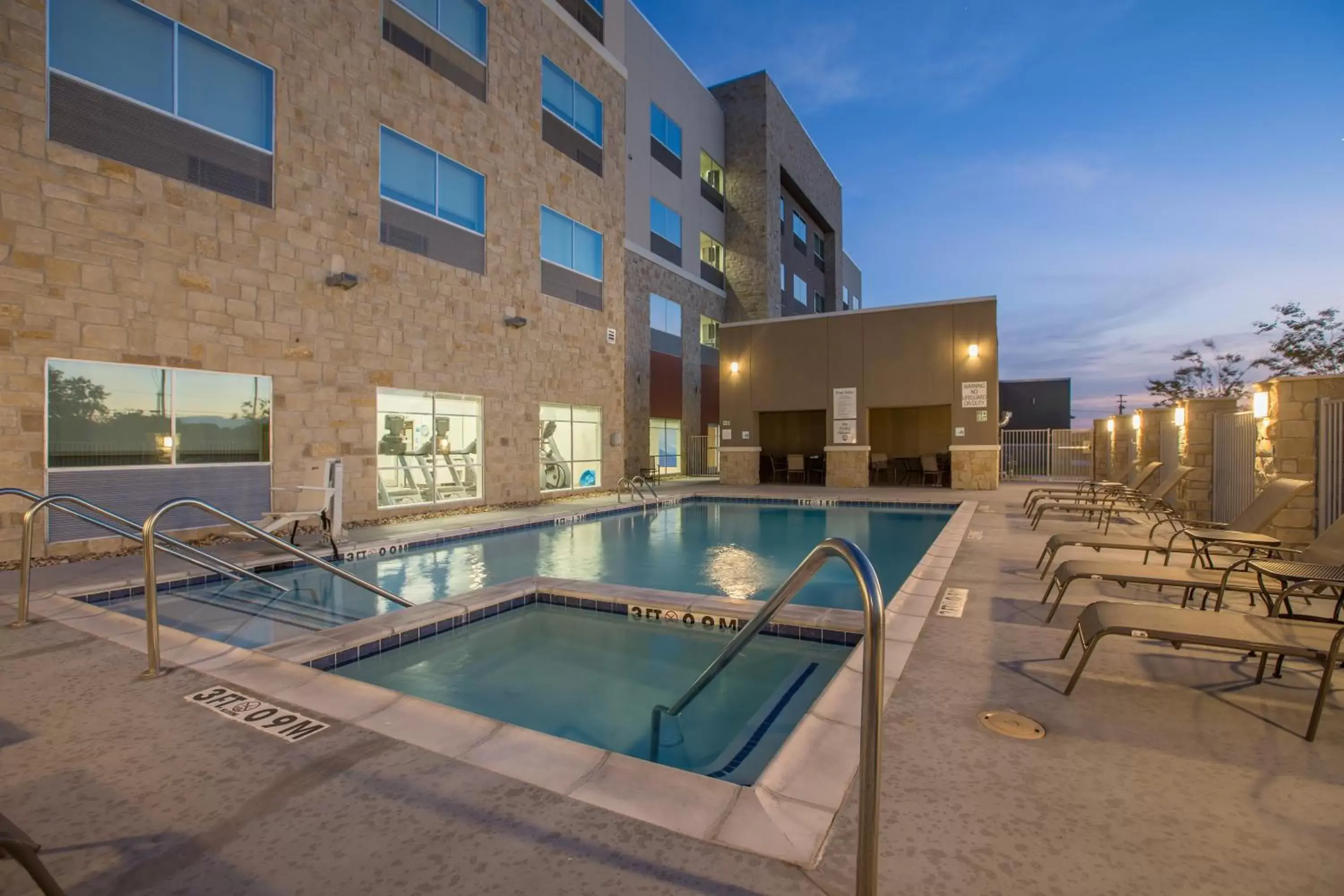 Swimming Pool in Holiday Inn Express & Suites - San Marcos South, an IHG Hotel