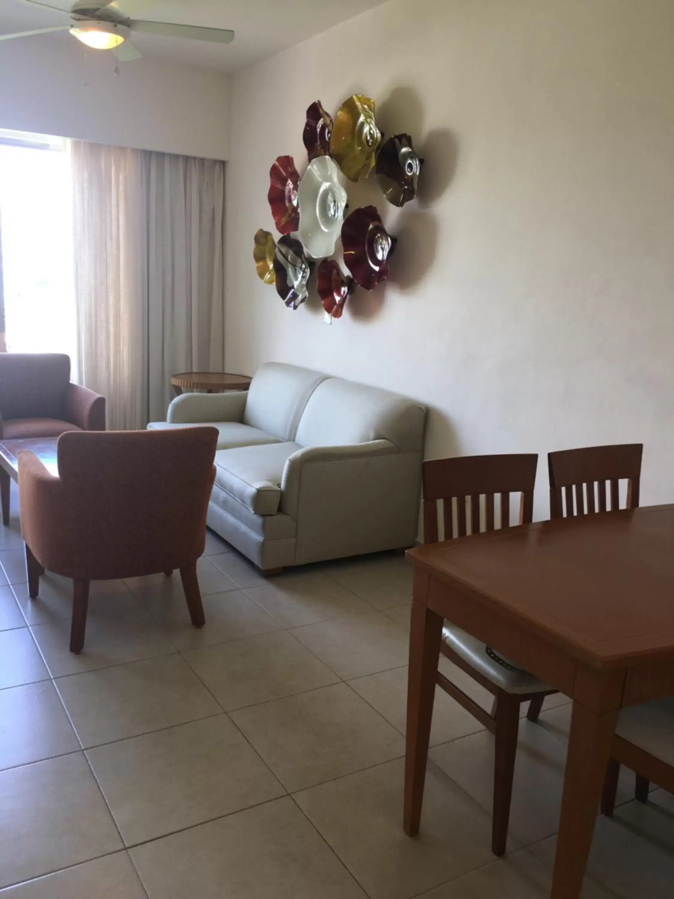 Living room, Seating Area in Ambiance Suites