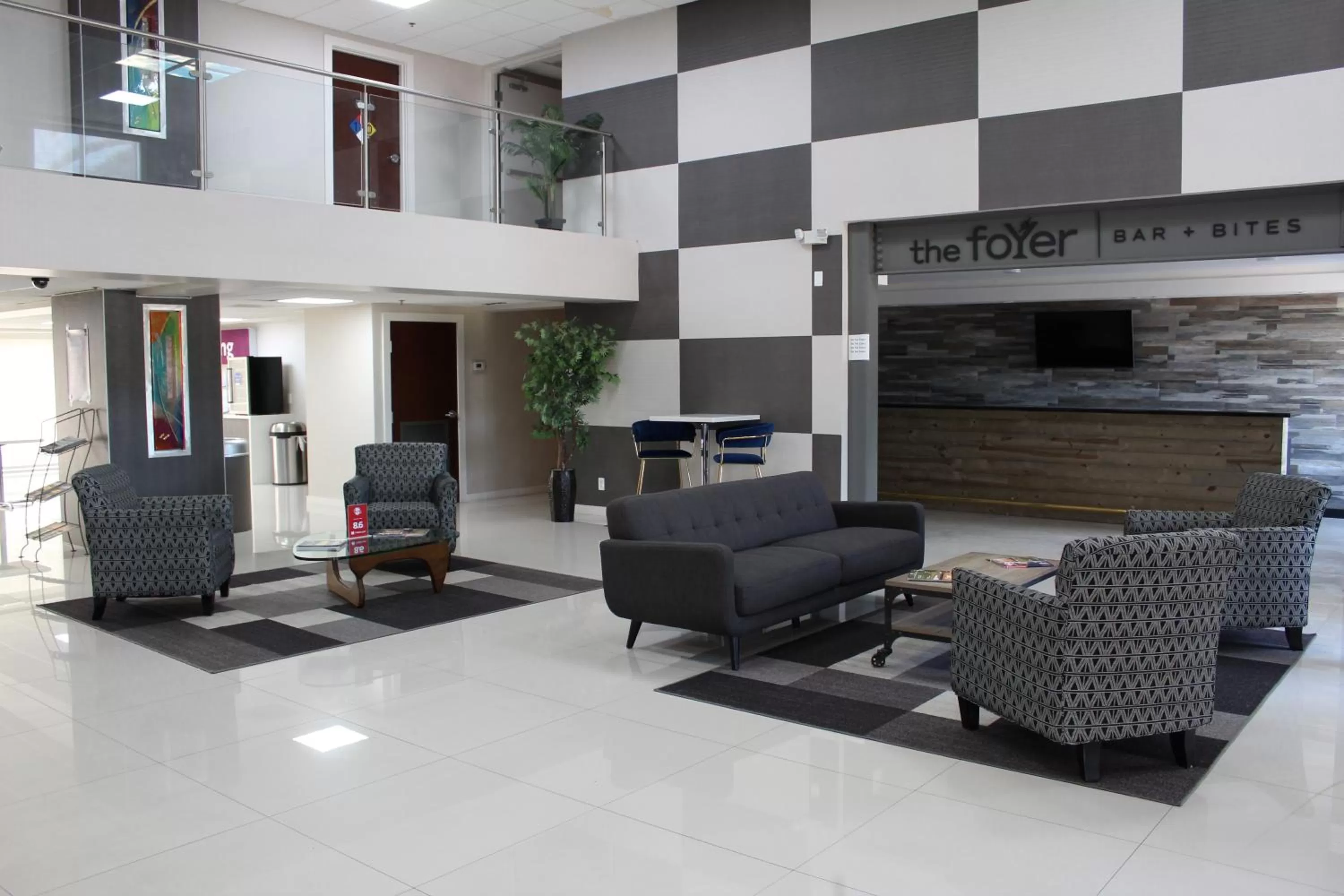 Lobby or reception in HoM, A Trademark Collection Hotel