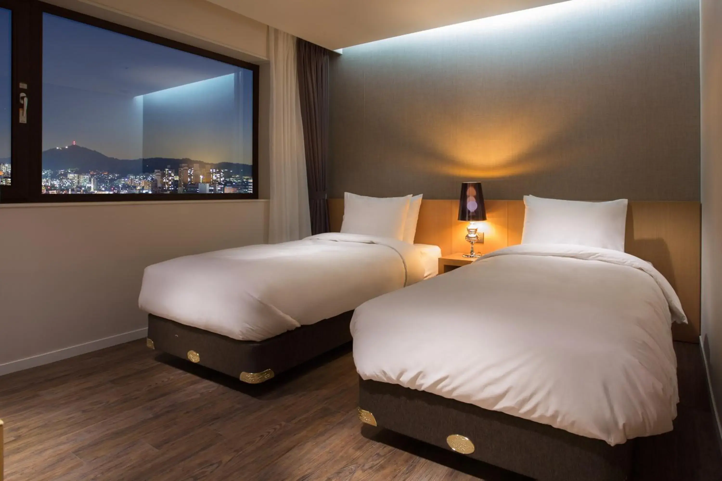 Bed in Amanti Hotel Seoul