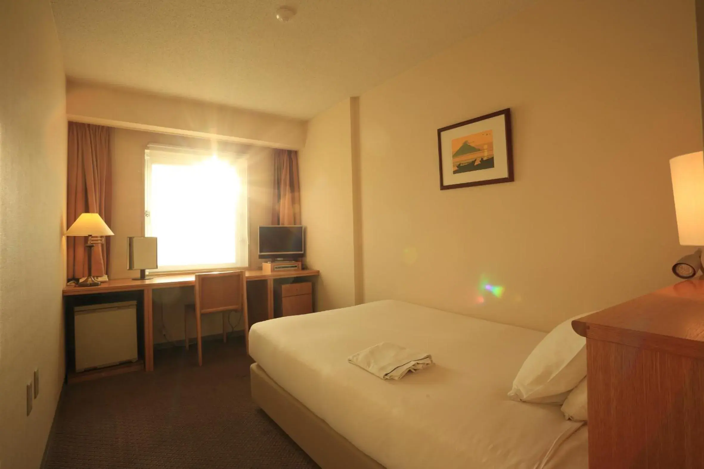 Bed in Smile Hotel Tomakomai