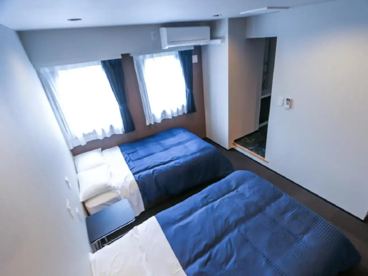 Bed in HOTEL LiVEMAX Yokohama Kannai Ekimae