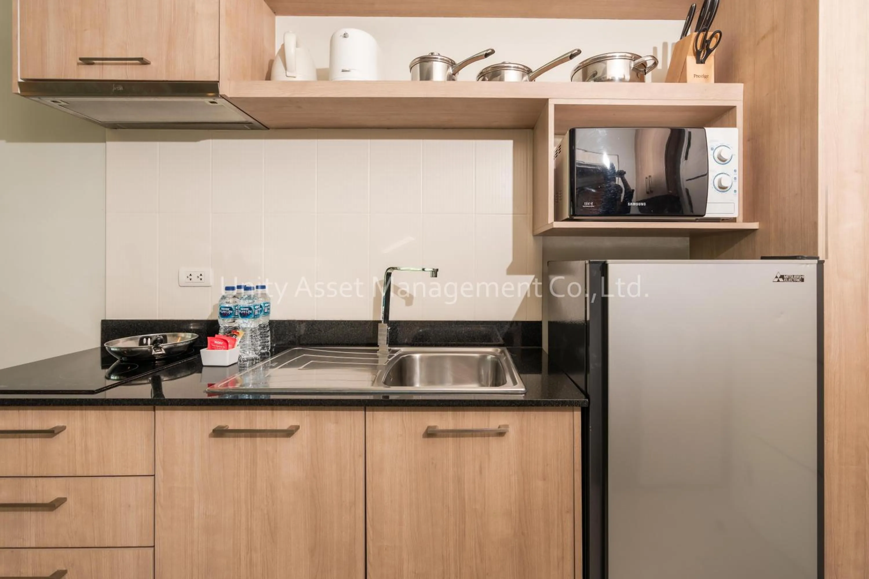 Kitchen or kitchenette in The Unity and The Bliss Patong Residence