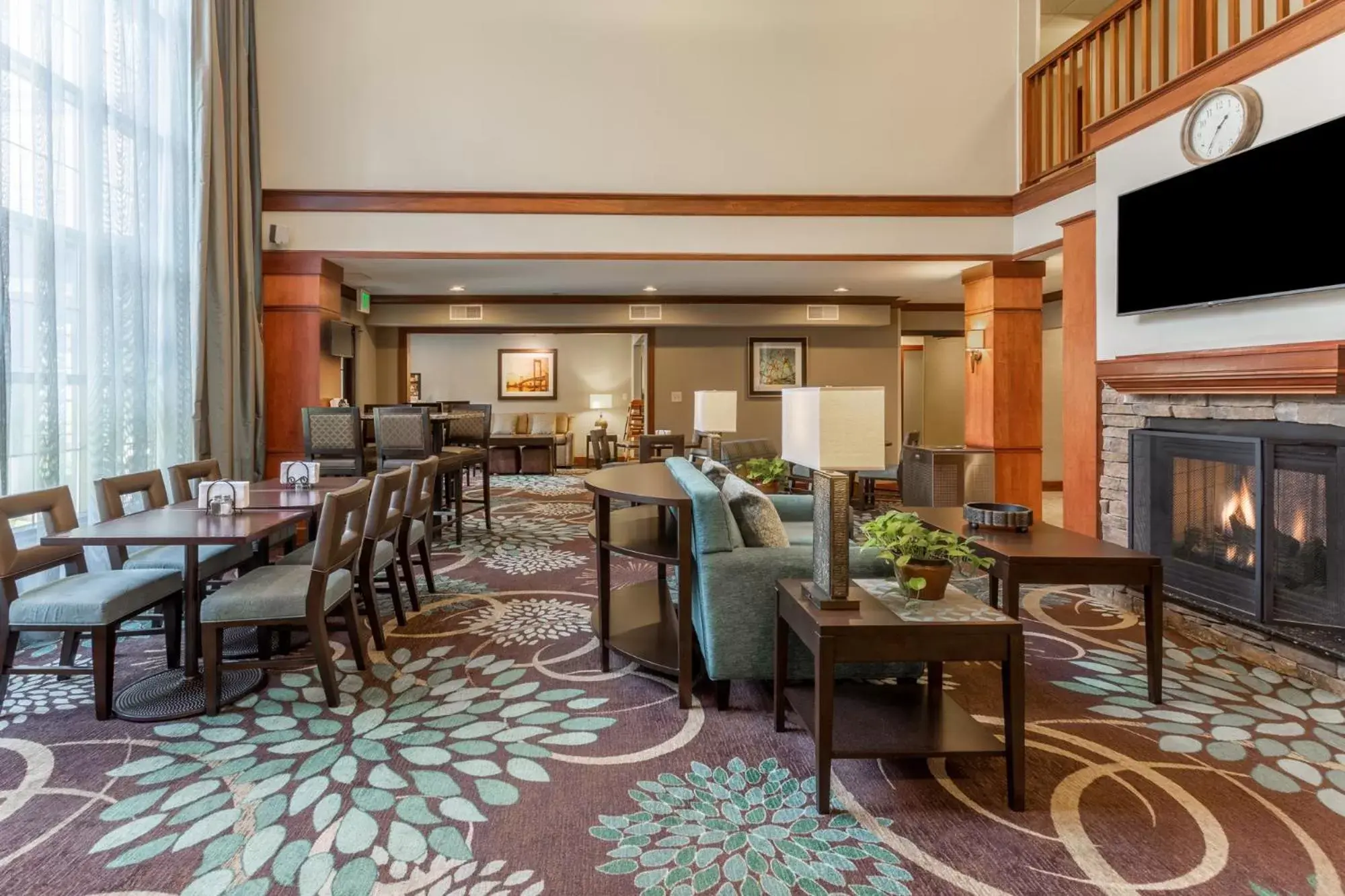 Communal lounge/ TV room, Restaurant/Places to Eat in Staybridge Suites Davenport, an IHG Hotel