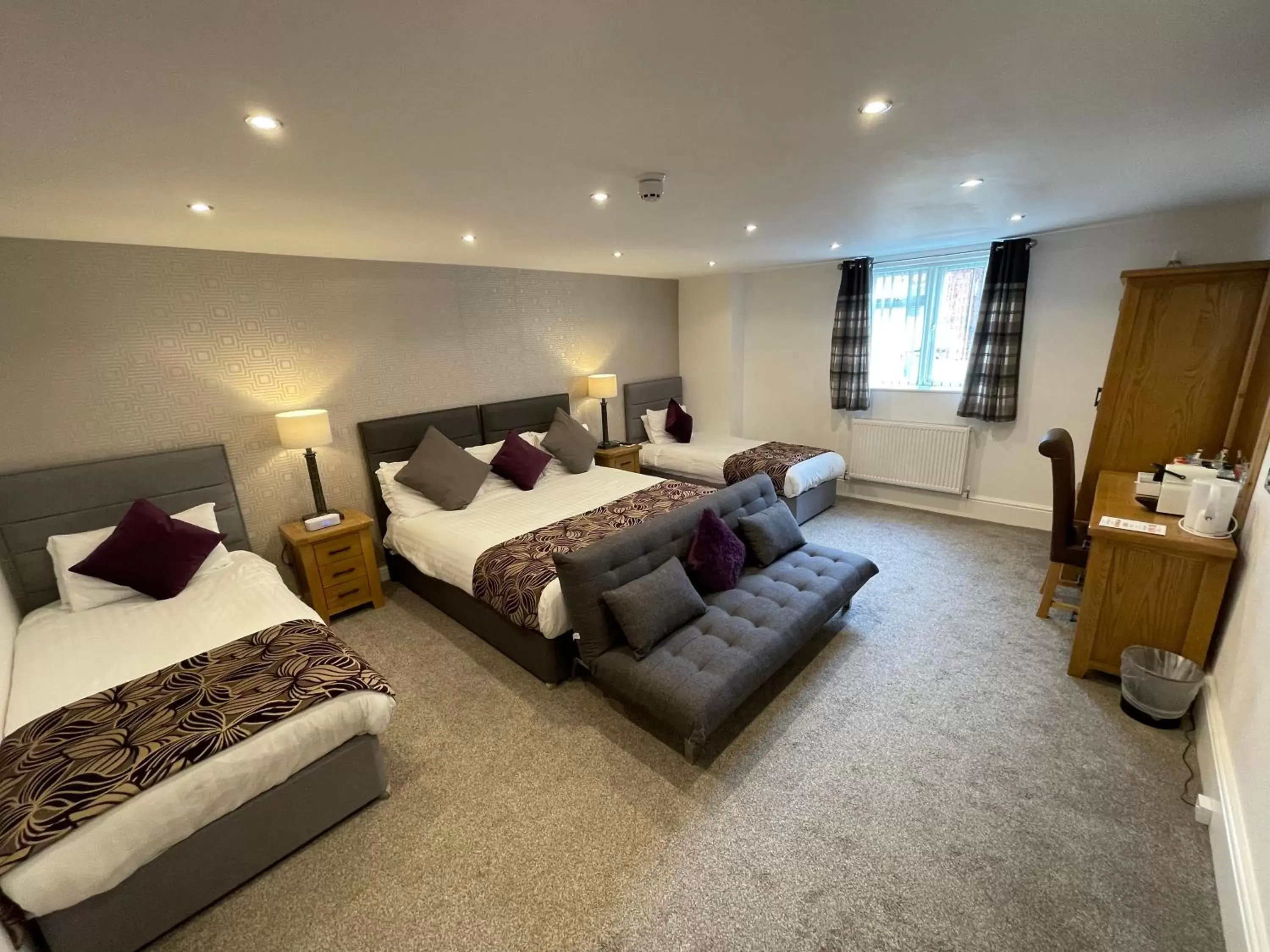 Premier Room (1 double & 2 Singles) in Ruskin Hotel Premier Room (1 double & 2 Singles) in Ruskin Hotel