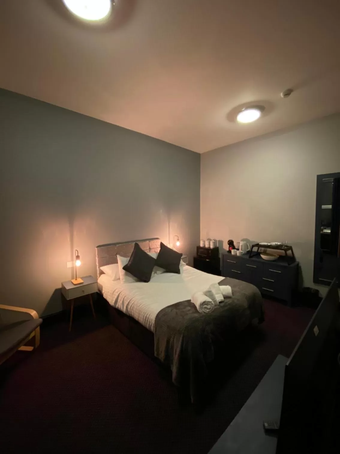 Bed in Bay view rooms at Mentone Hotel