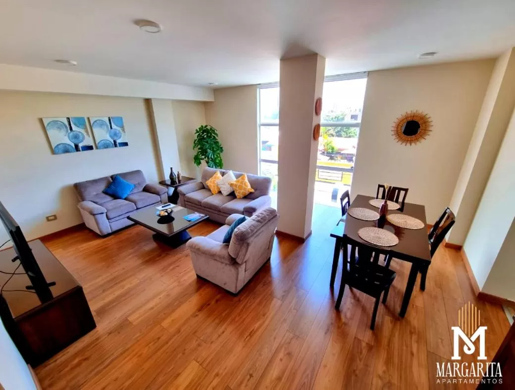 Communal lounge/ TV room in Margarita Apartamentos