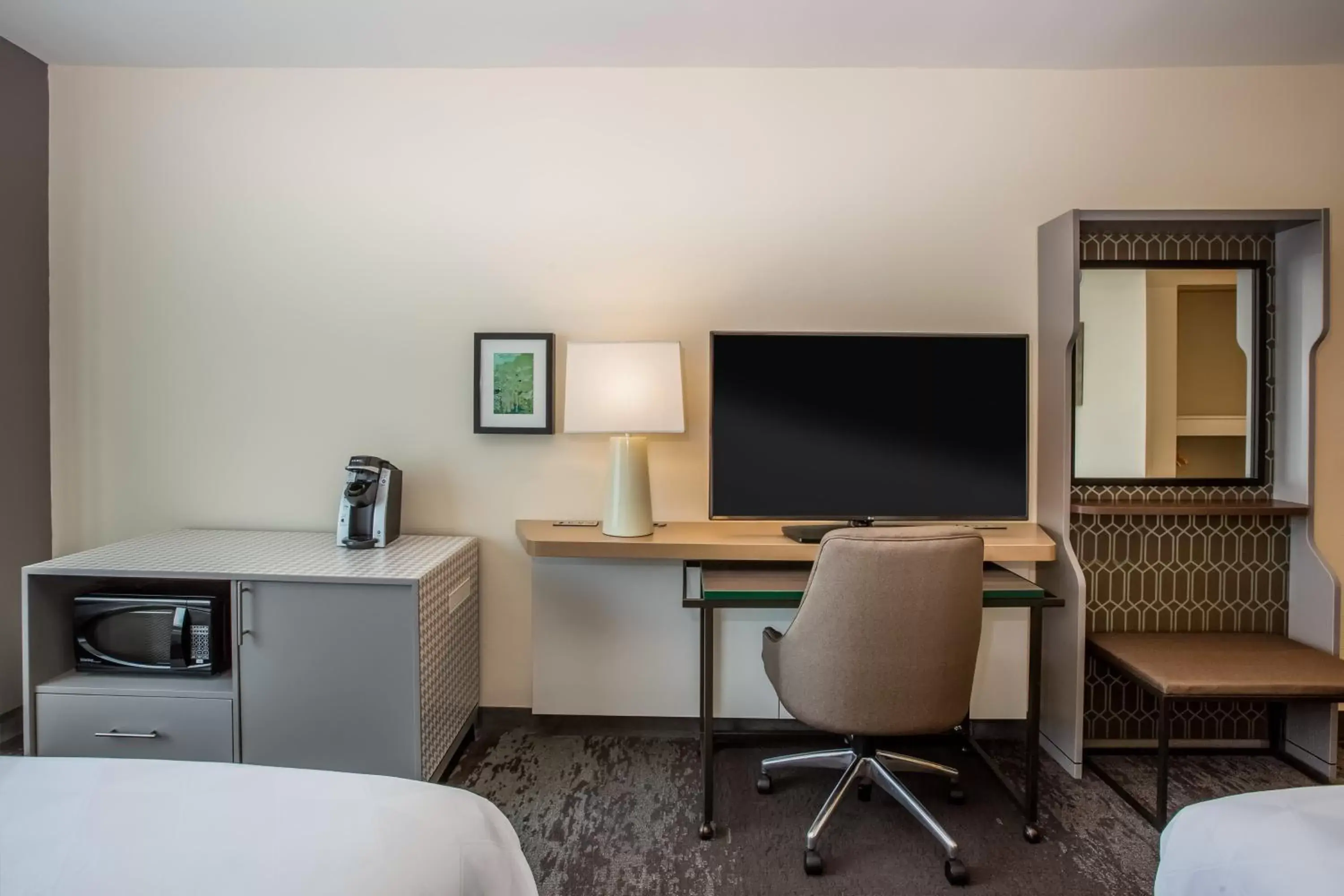 Photo of the whole room, TV/Entertainment Center in Holiday Inn - Gulfport-Airport, an IHG Hotel