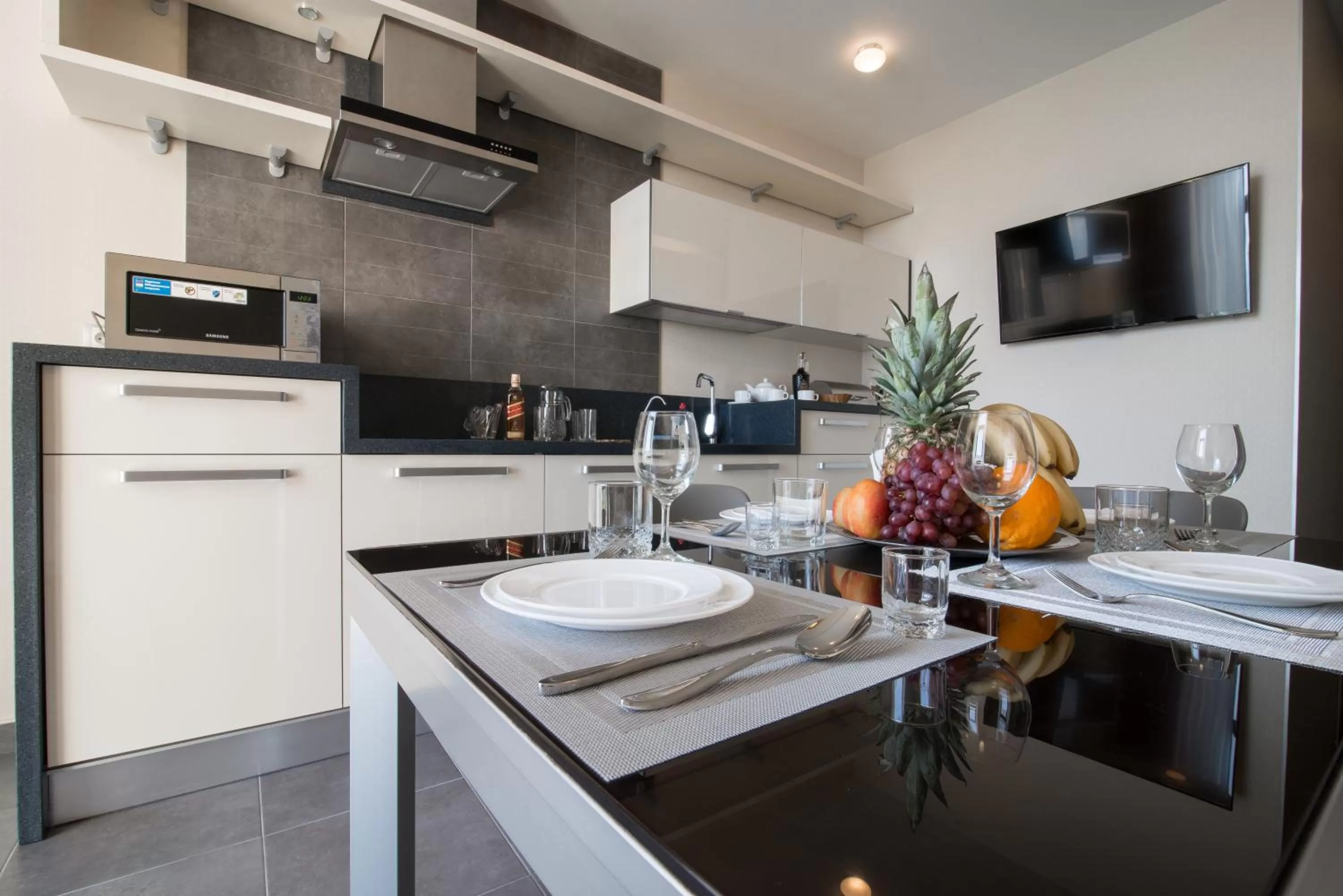 Kitchen or kitchenette in 12th Floor Apartments