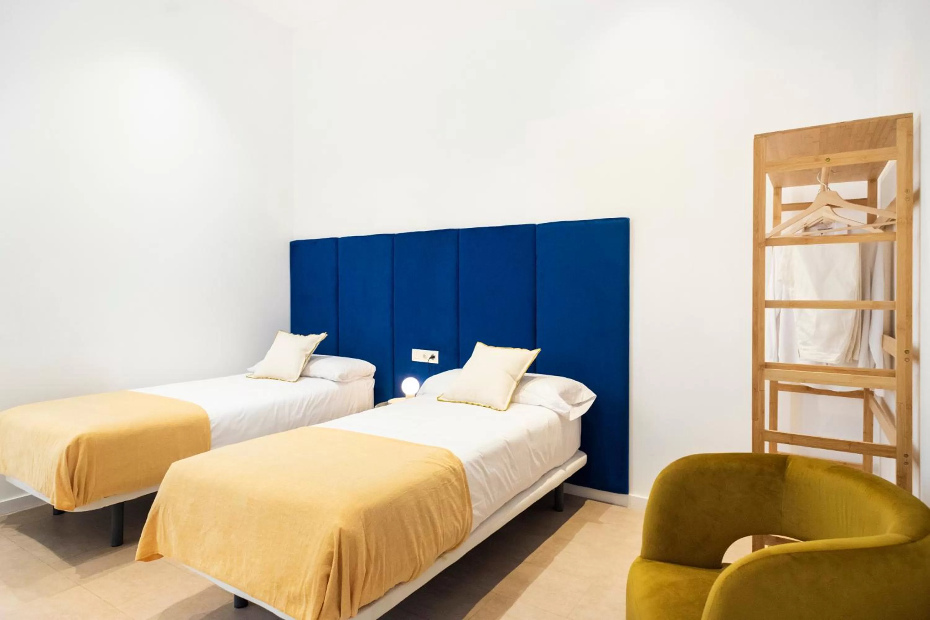 Bed in Blanq Marina Suites