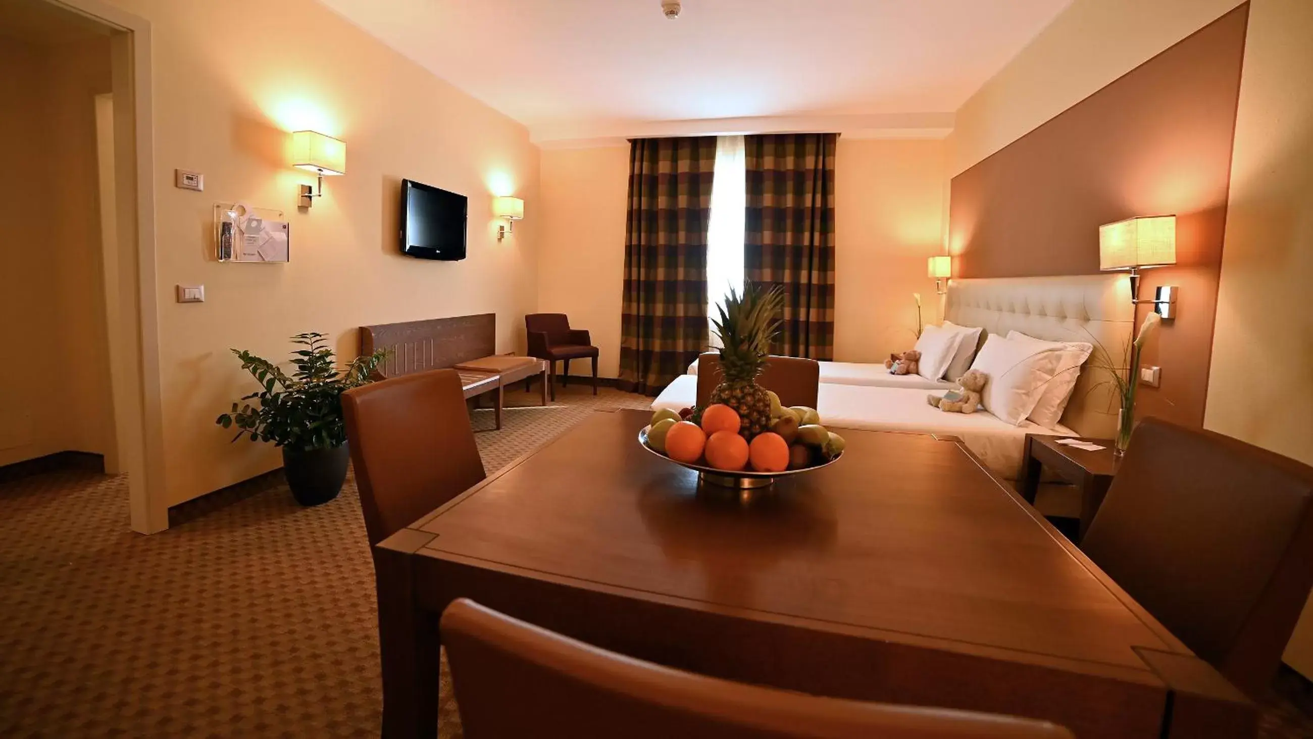 Bed, Dining Area in Best Western Grand Hotel Guinigi