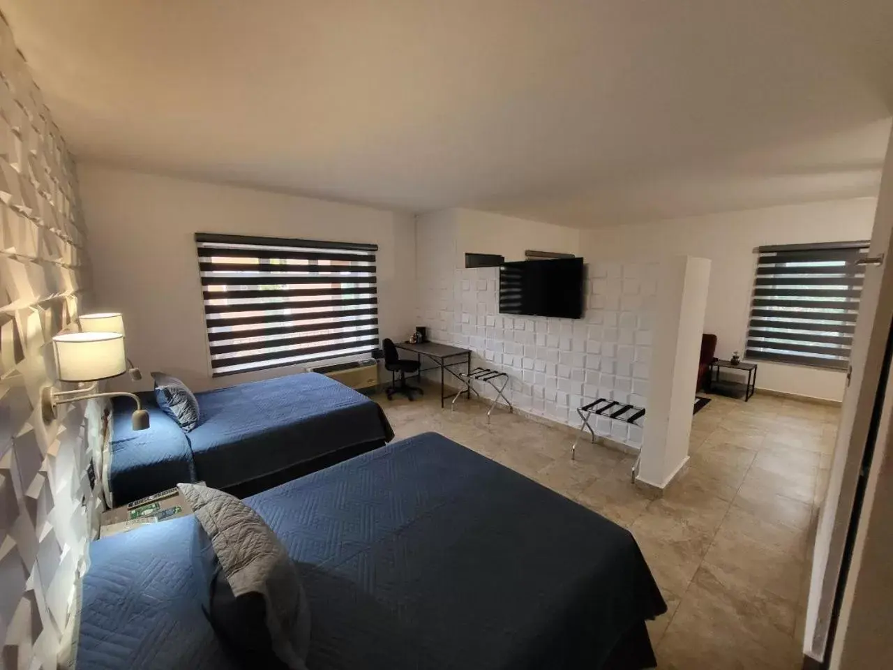 Bed, Seating Area in Palmareca Inn-Suites-Studio
