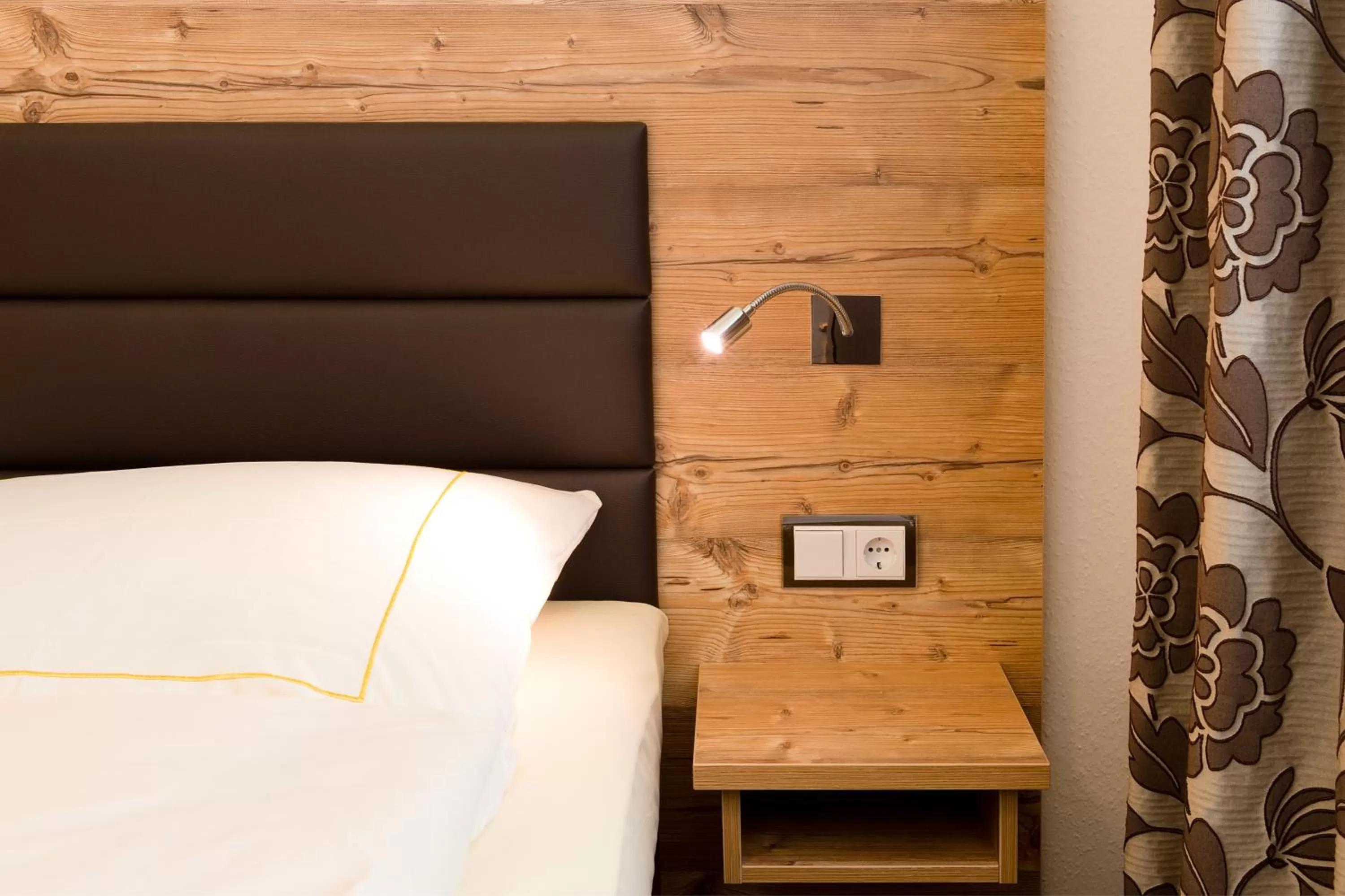 Decorative detail, Bed in Hotel SCHNEIDER