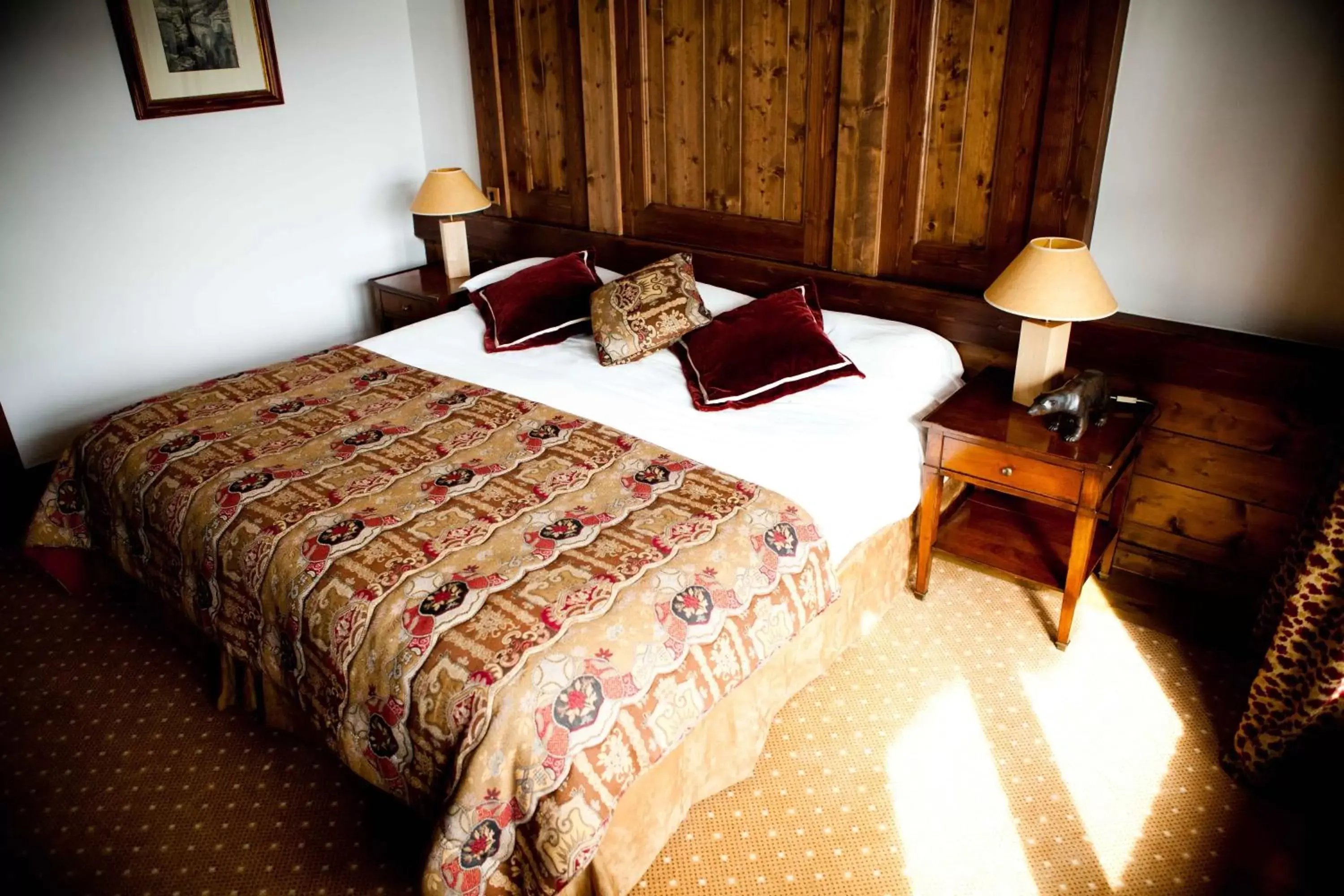 Bed in Hôtel Les Barmes De l'Ours