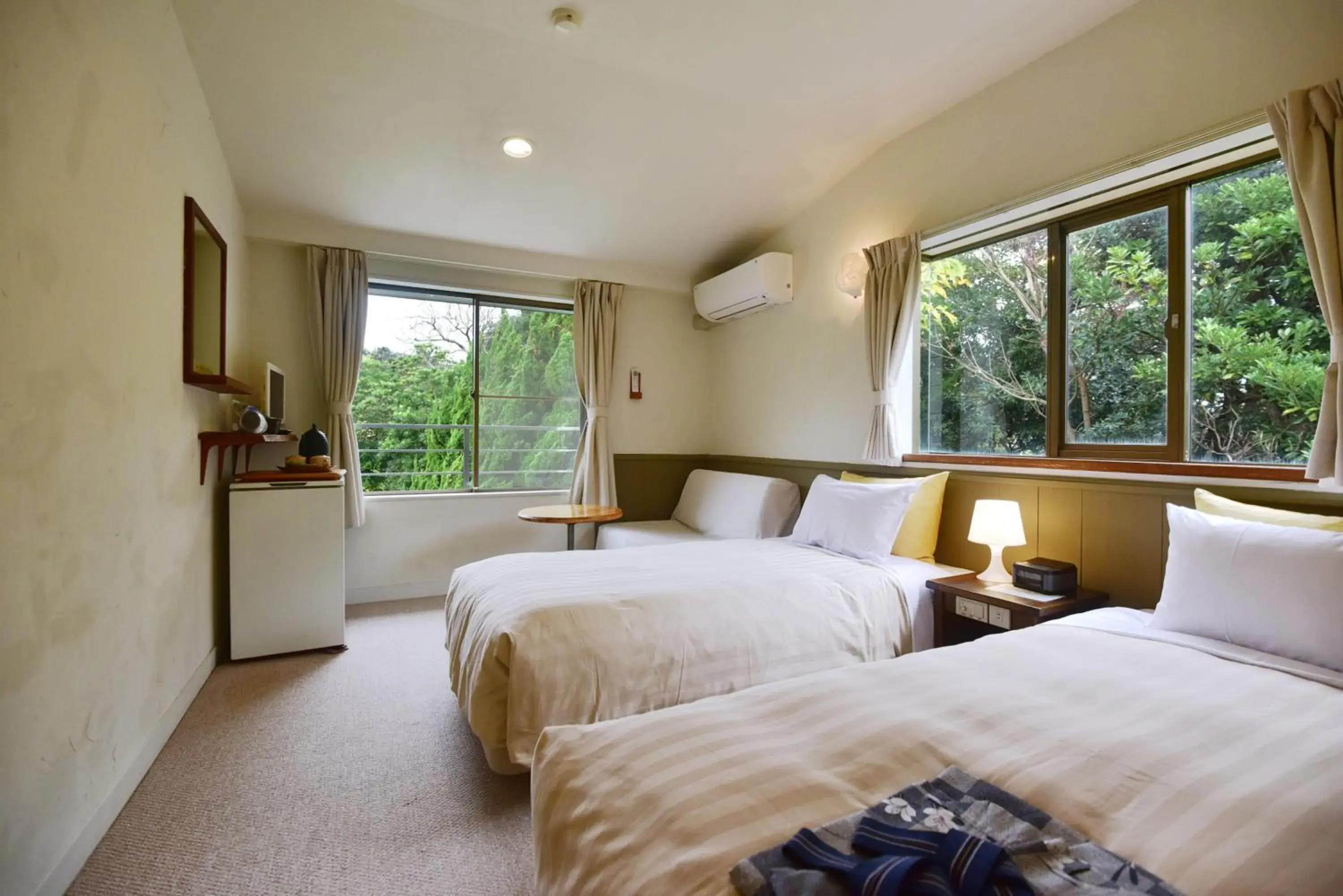 Bed in Gardenvilla Shirahama Bed in Gardenvilla Shirahama