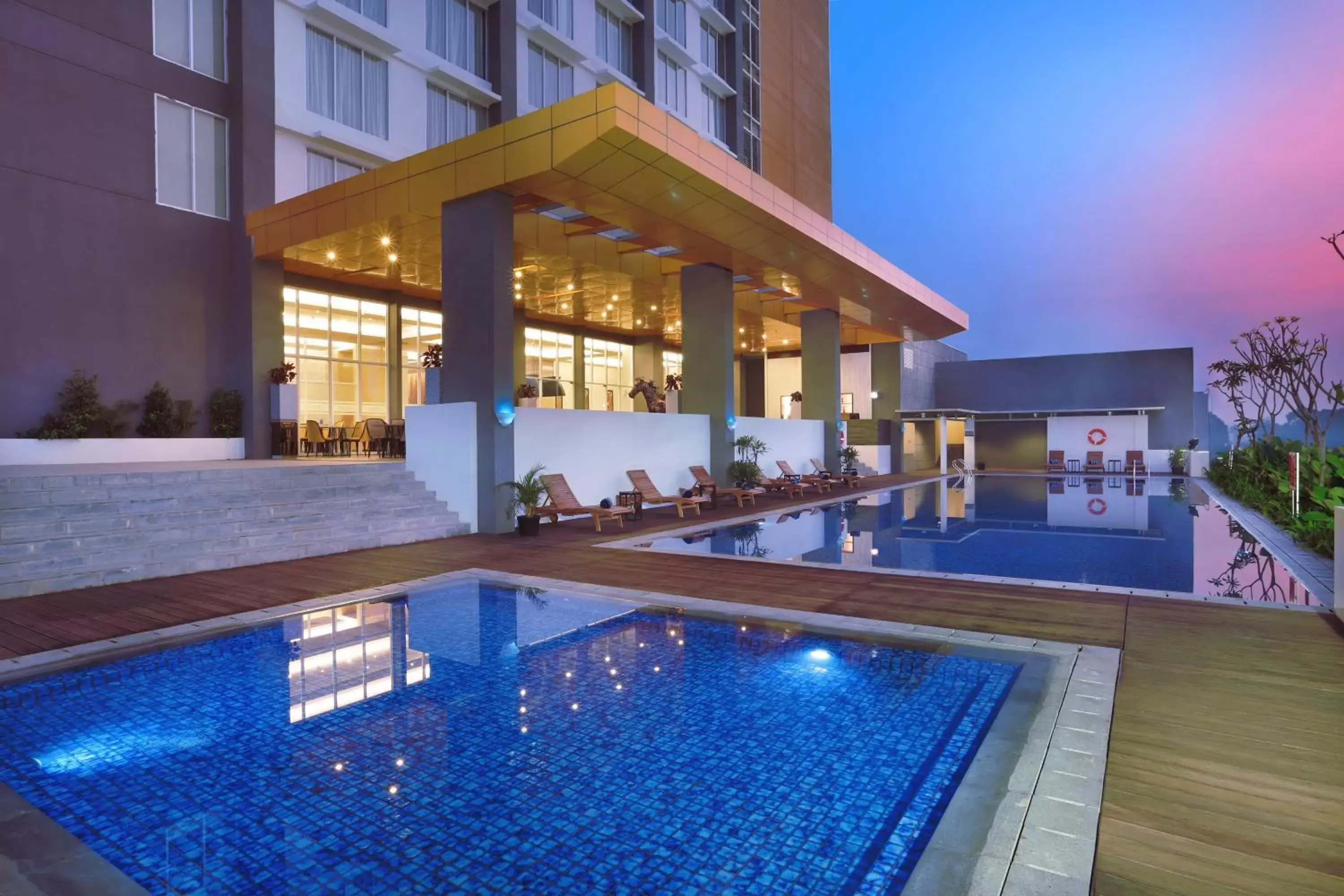 Bedroom, Swimming Pool in ASTON Banua Banjarmasin Hotel & Convention Center