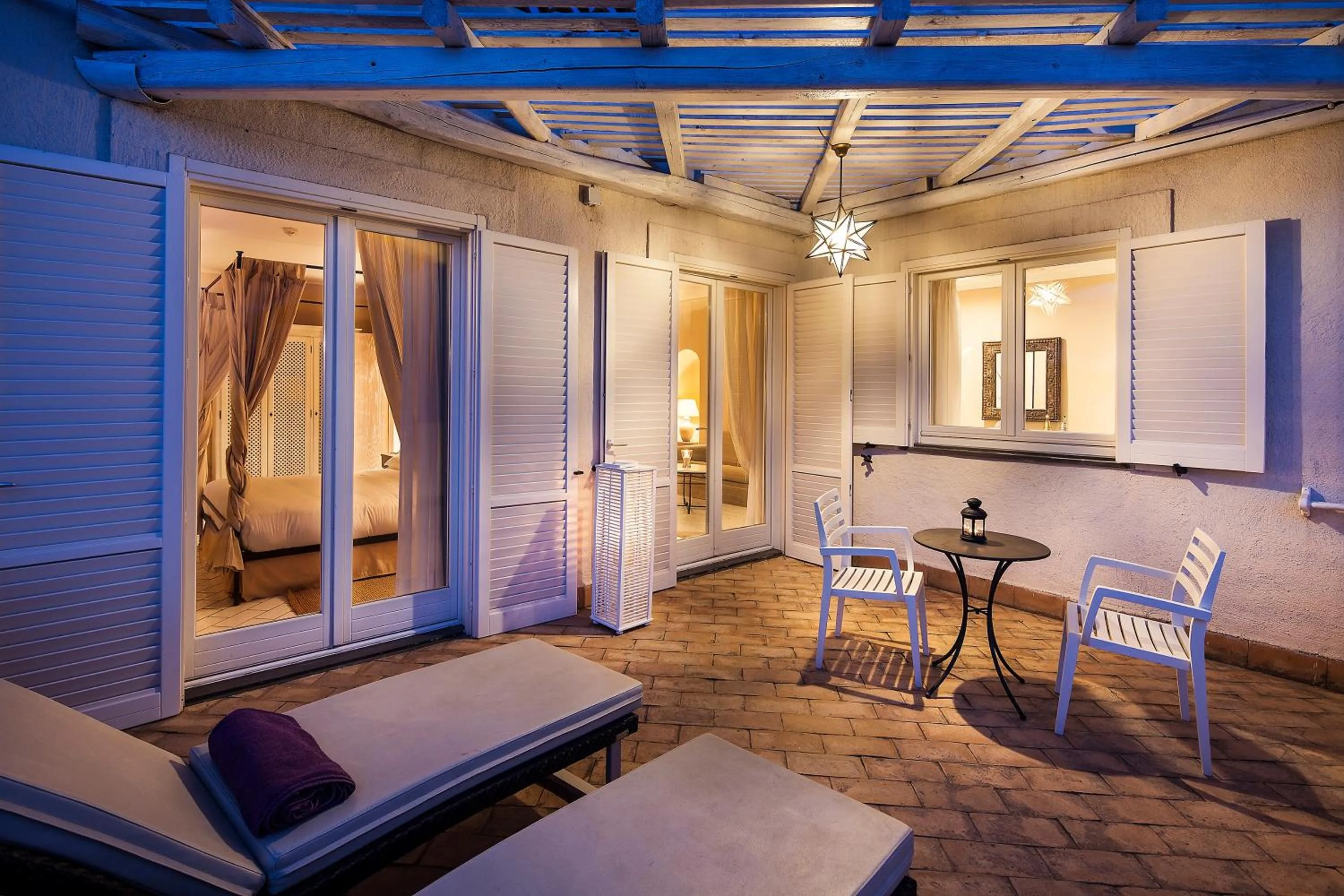 Balcony/Terrace, Bed in Therasia Resort Sea and SPA - The Leading Hotels of the World