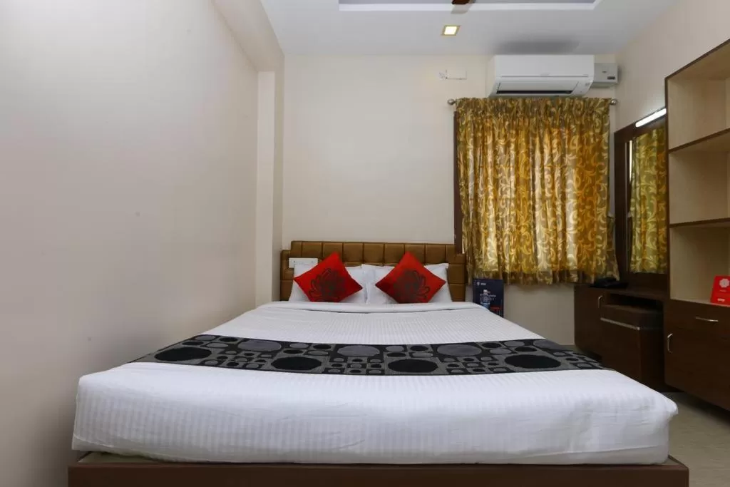 Bed in Sri Kamadhenu Residency