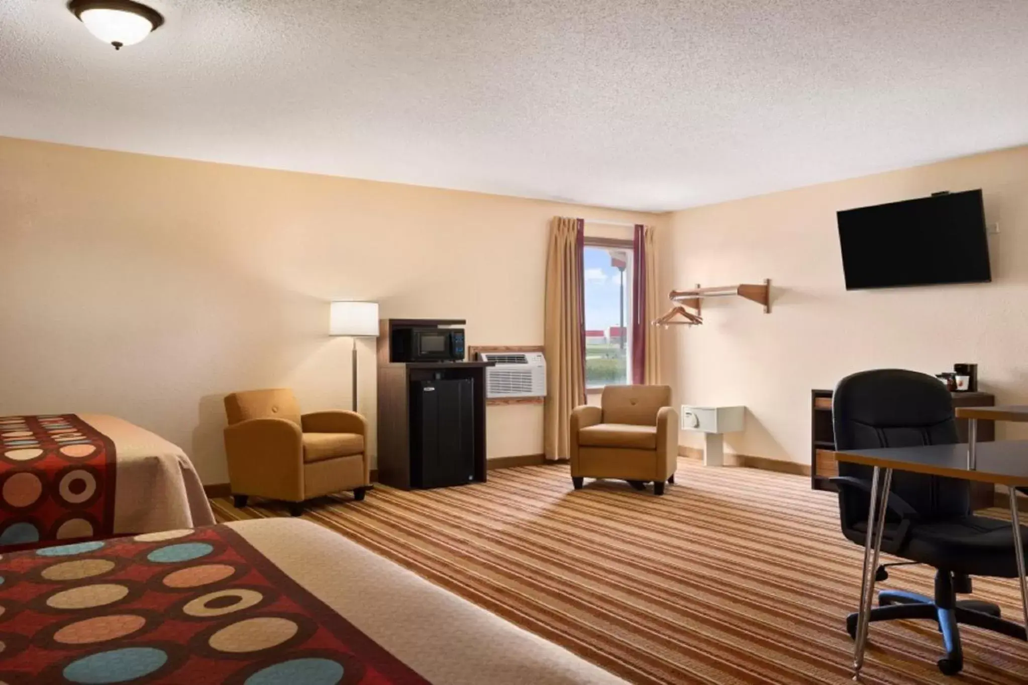 Bedroom, TV/Entertainment Center in Super 8 by Wyndham Mattoon