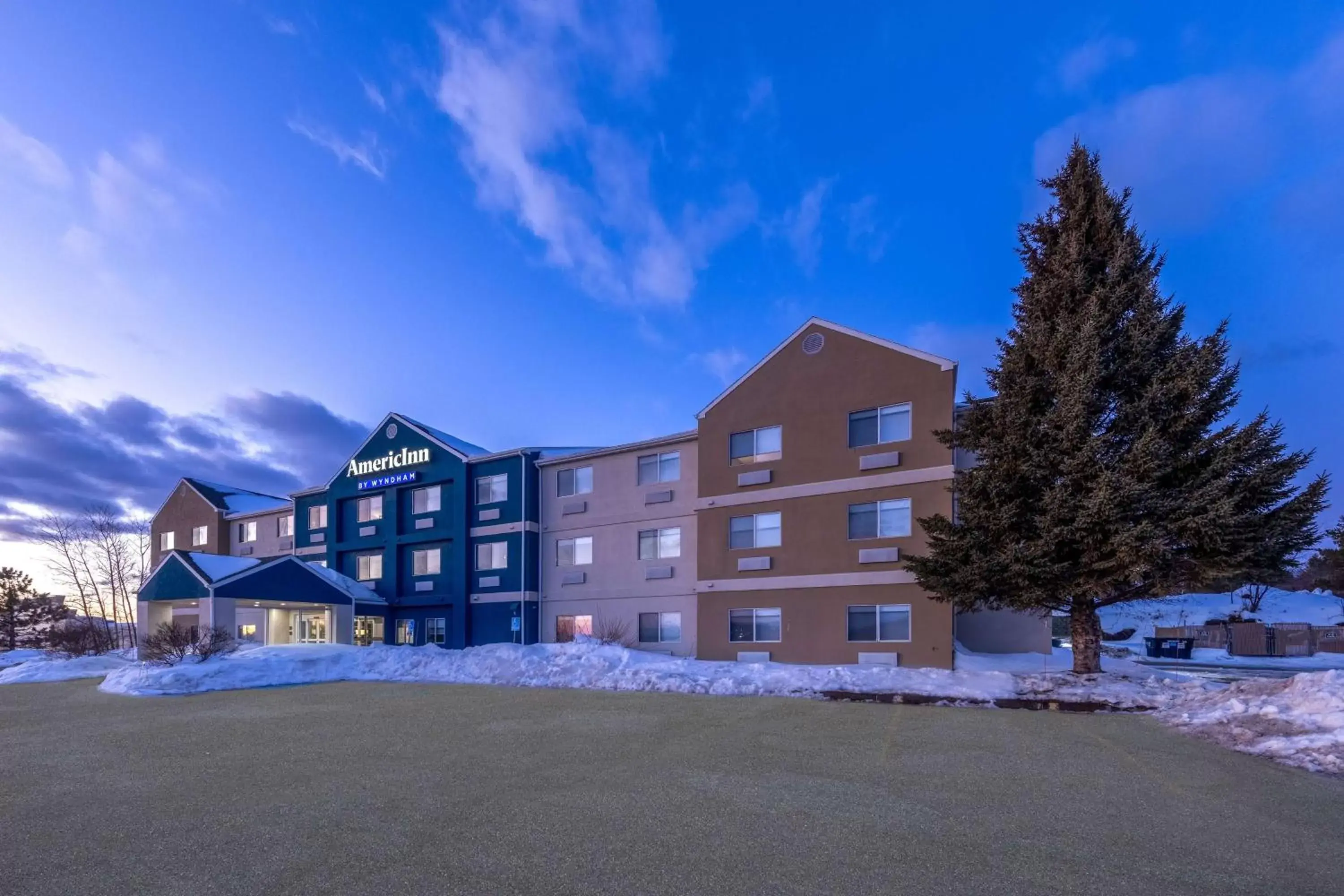 Property building, Winter in AmericInn by Wyndham Duluth