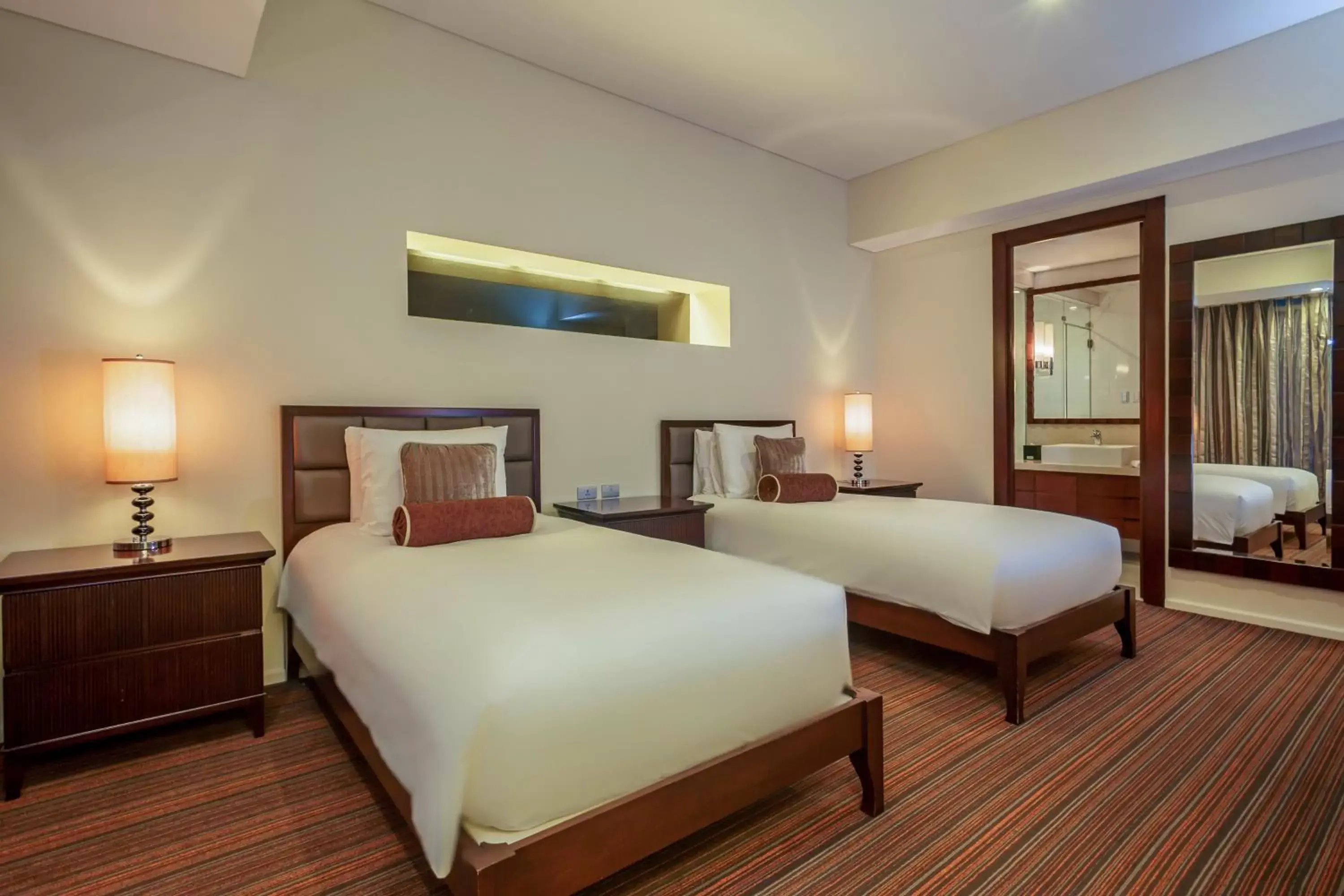 Bed in Joy-Nostalg Hotel & Suites Manila Managed by AccorHotels