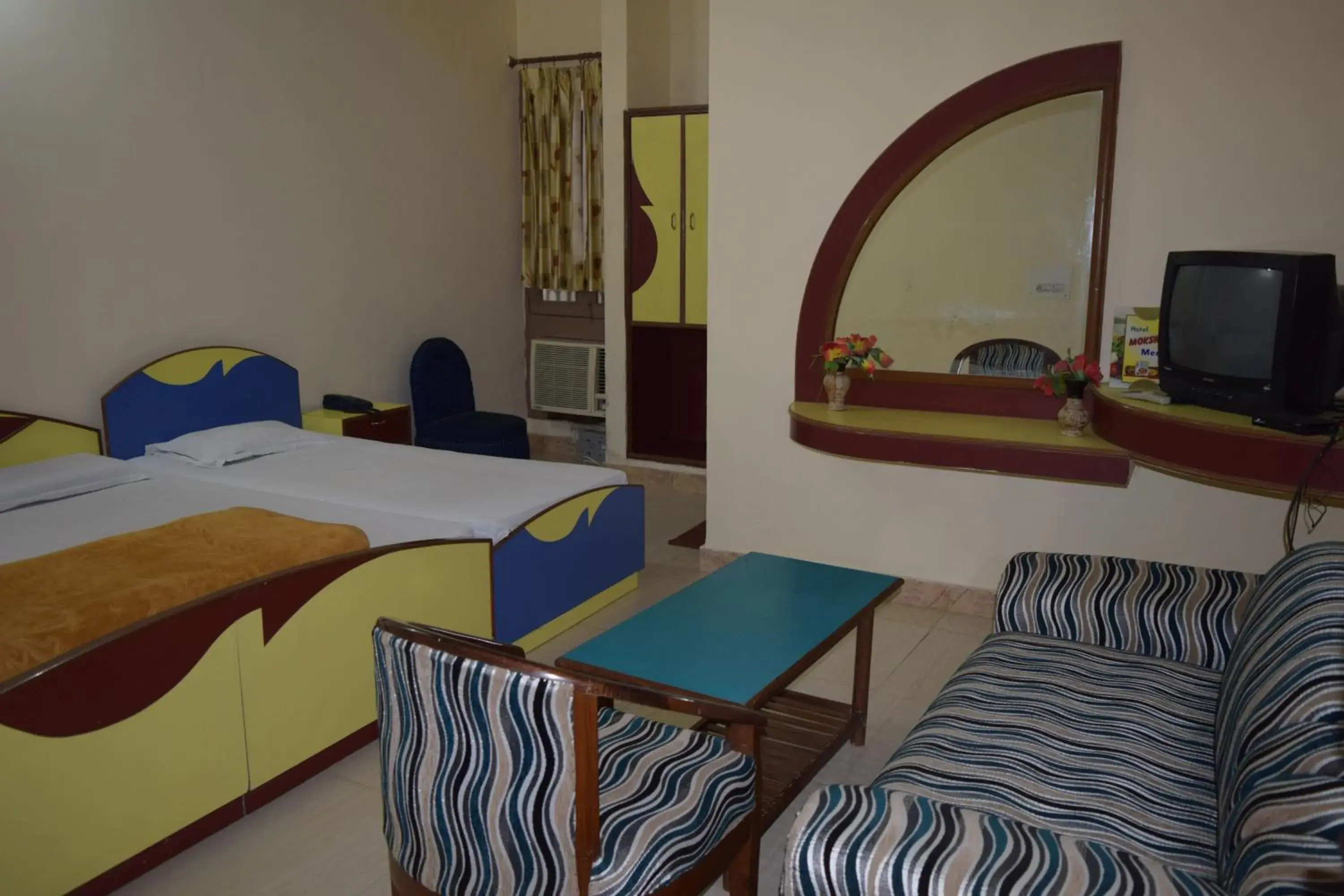 Photo of the whole room, Room Photo in Hotel Moksha (Previously Raj Deep)