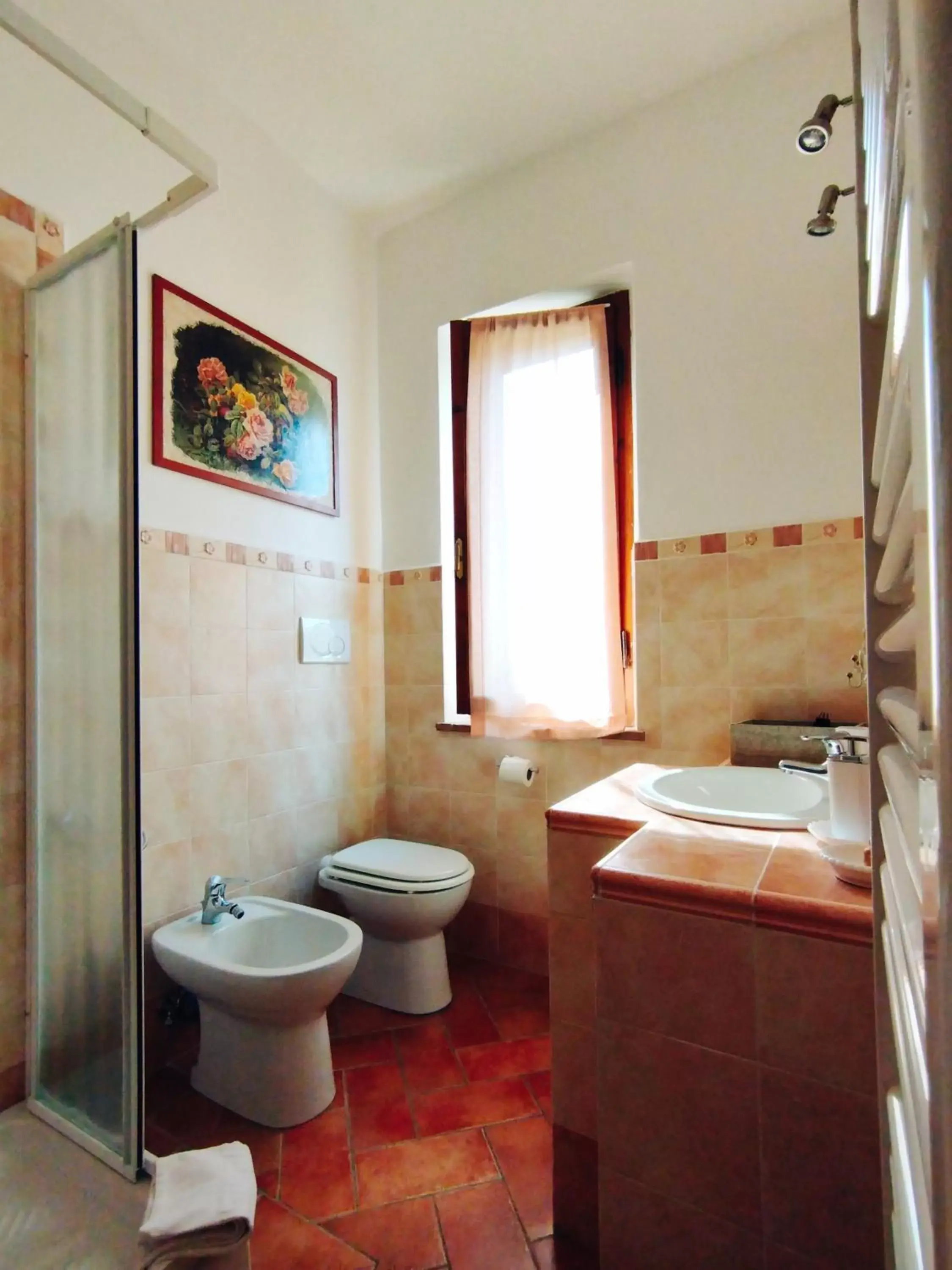 Bathroom in La Casa tra Gli Ulivi Cottage House