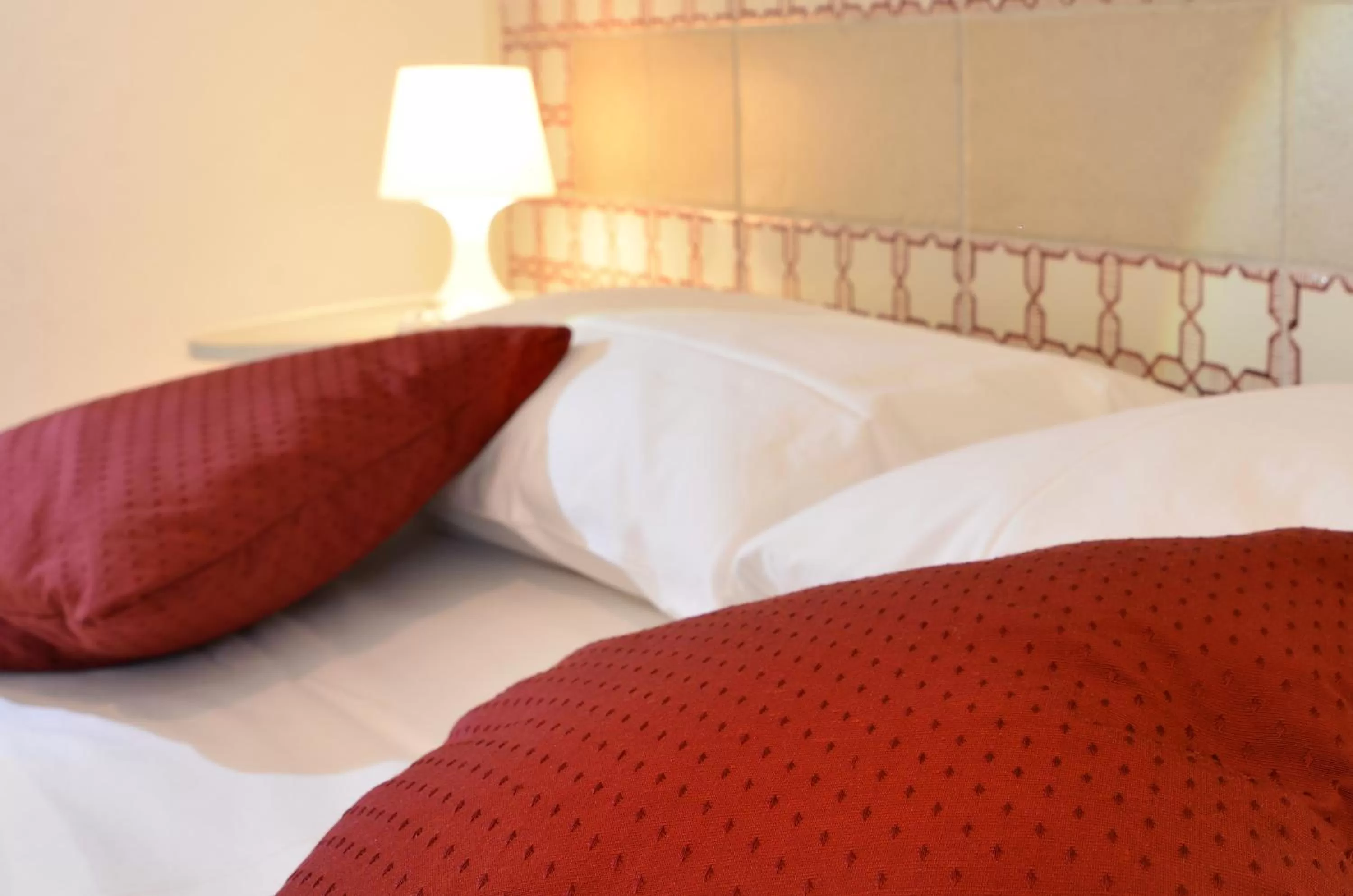 Bed in Santi e Saraceni Rooms