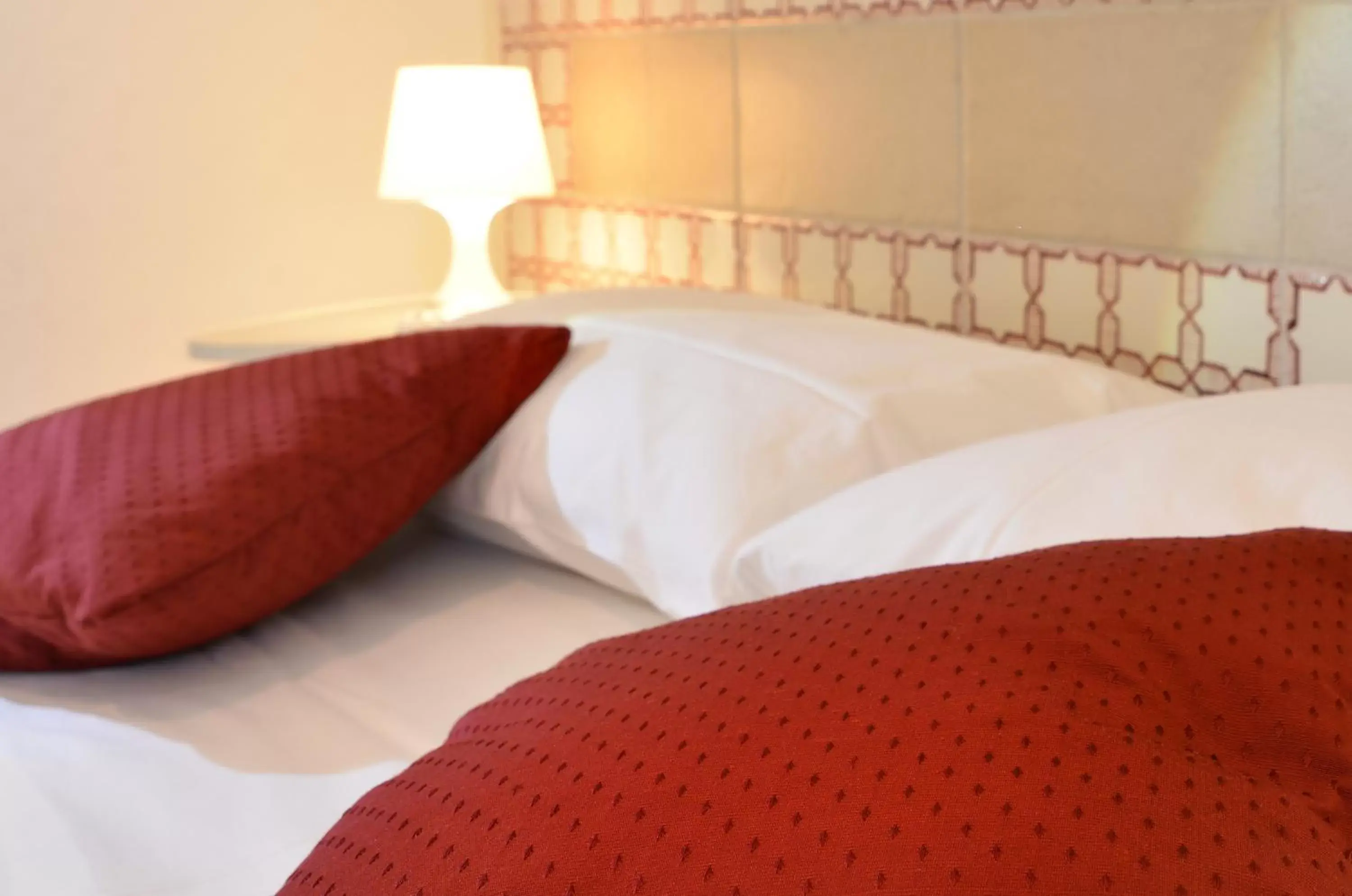 Bed in Santi e Saraceni Rooms Bed in Santi e Saraceni Rooms