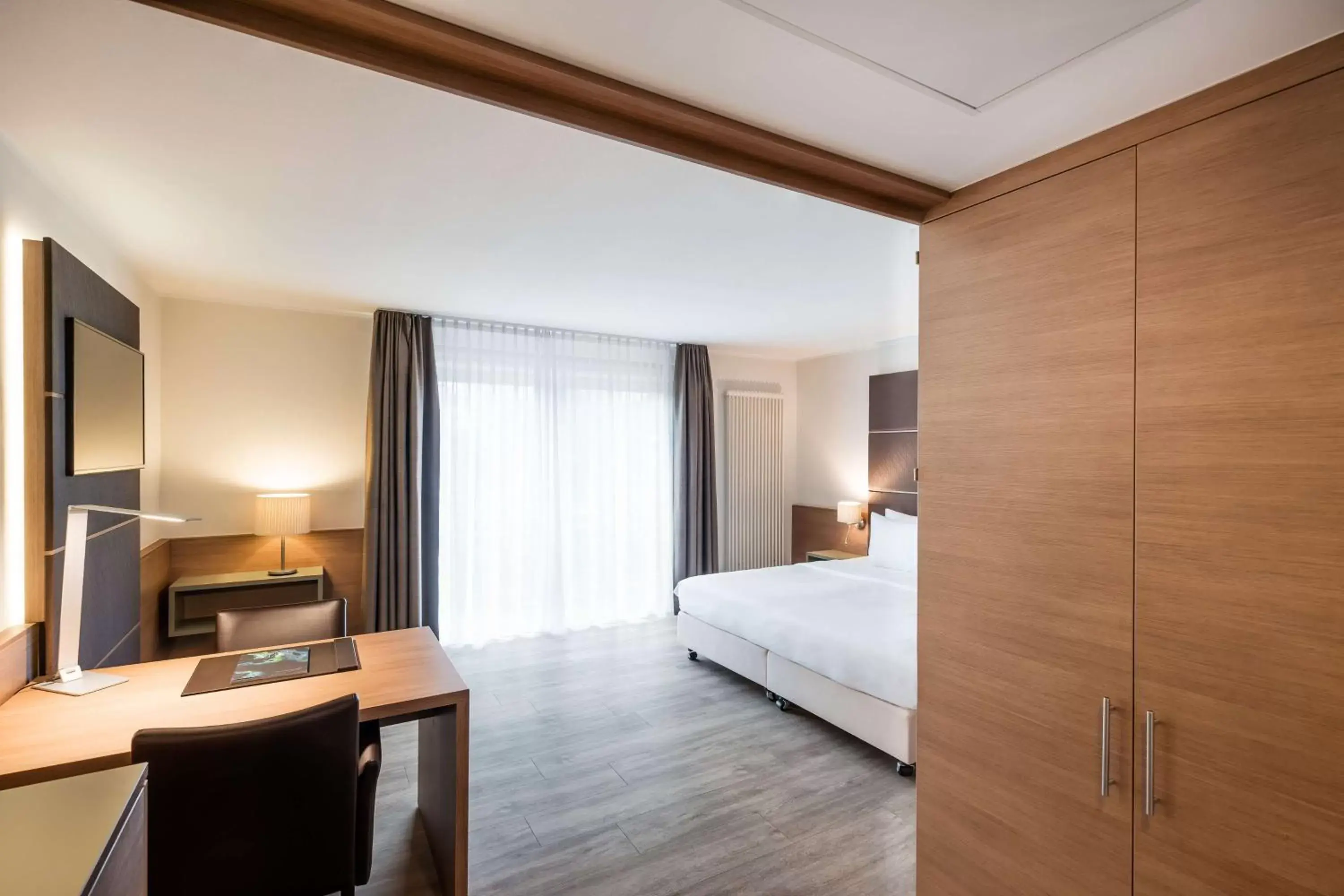 Photo of the whole room, Bed in Lindner Hotel Dusseldorf Airport
