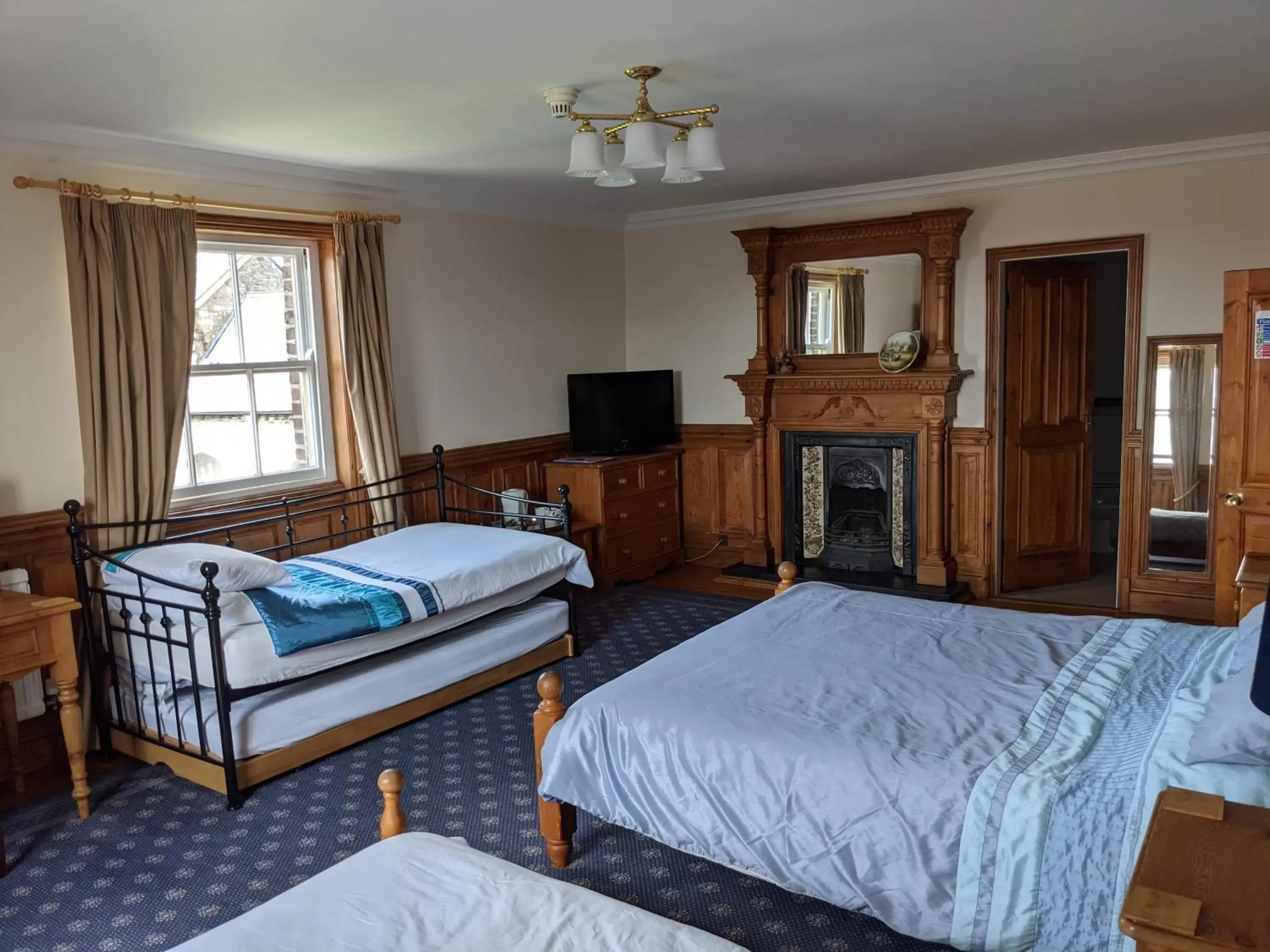 Bed in The Londesborough Arms bar with en-suite rooms