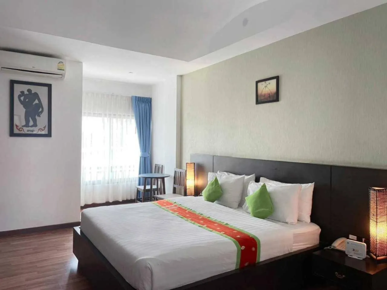 Bed in Jingjit Hotel