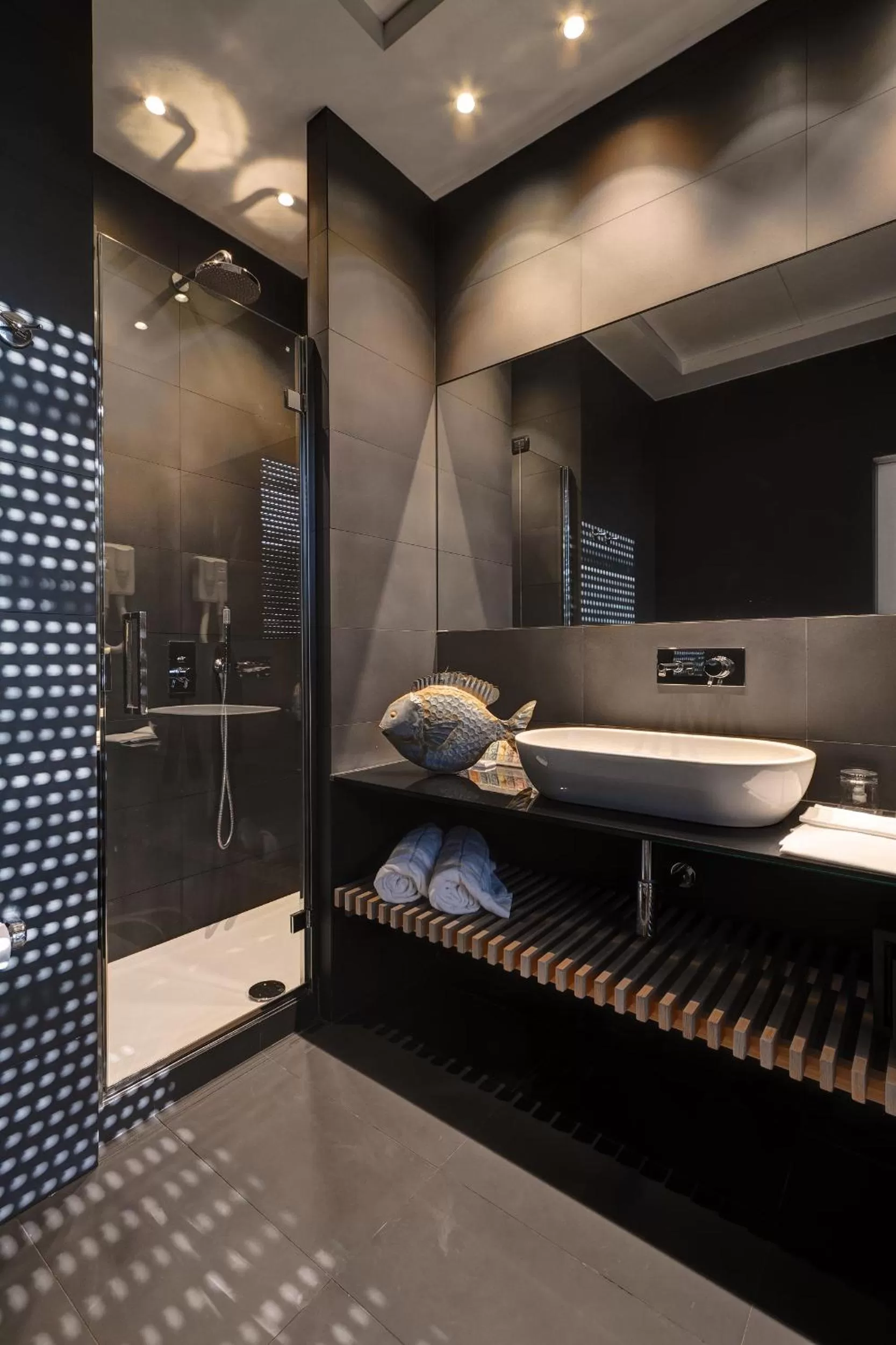 Bathroom in Alpi Hotel