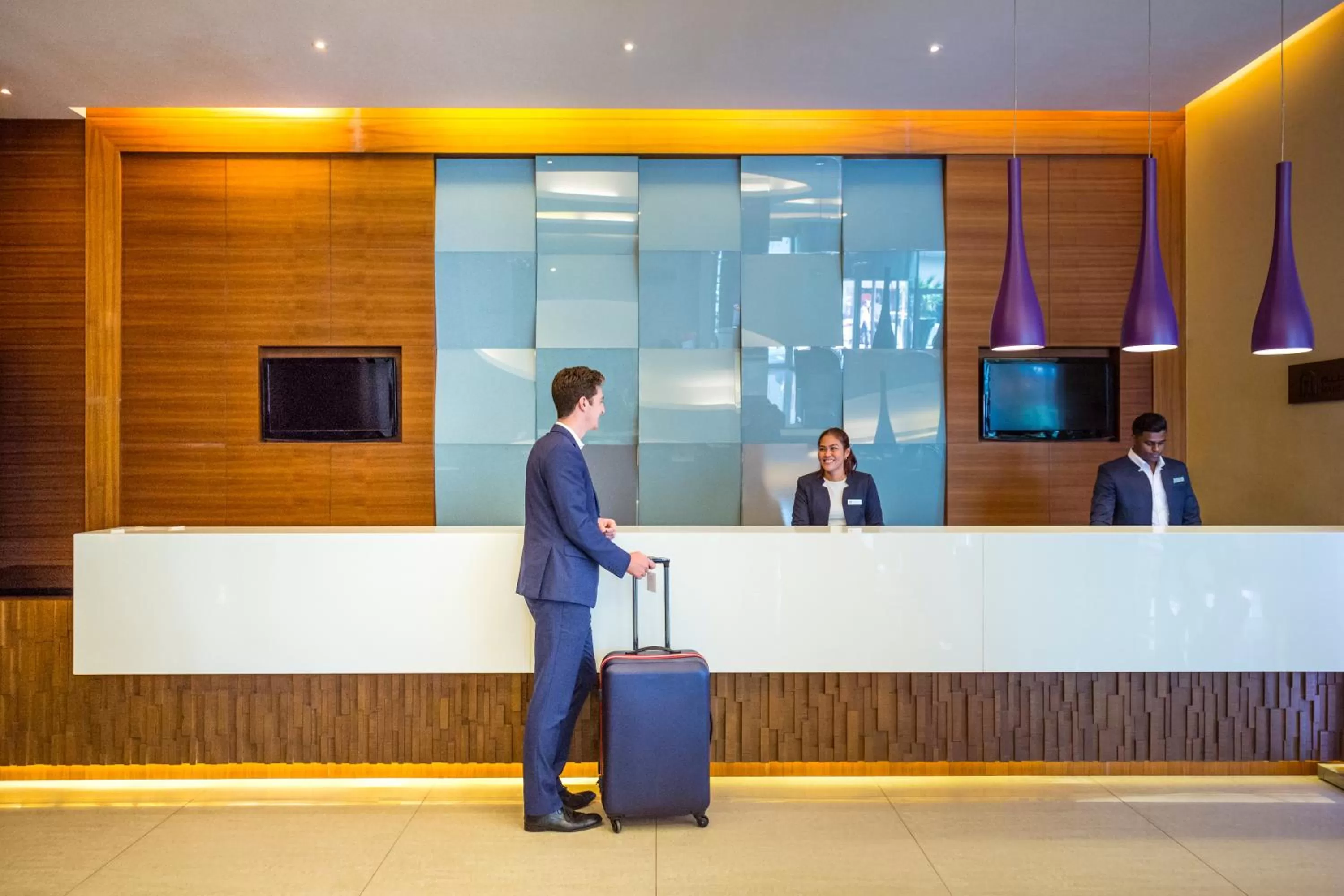 Staff in Novotel Suites Mall Avenue Dubai