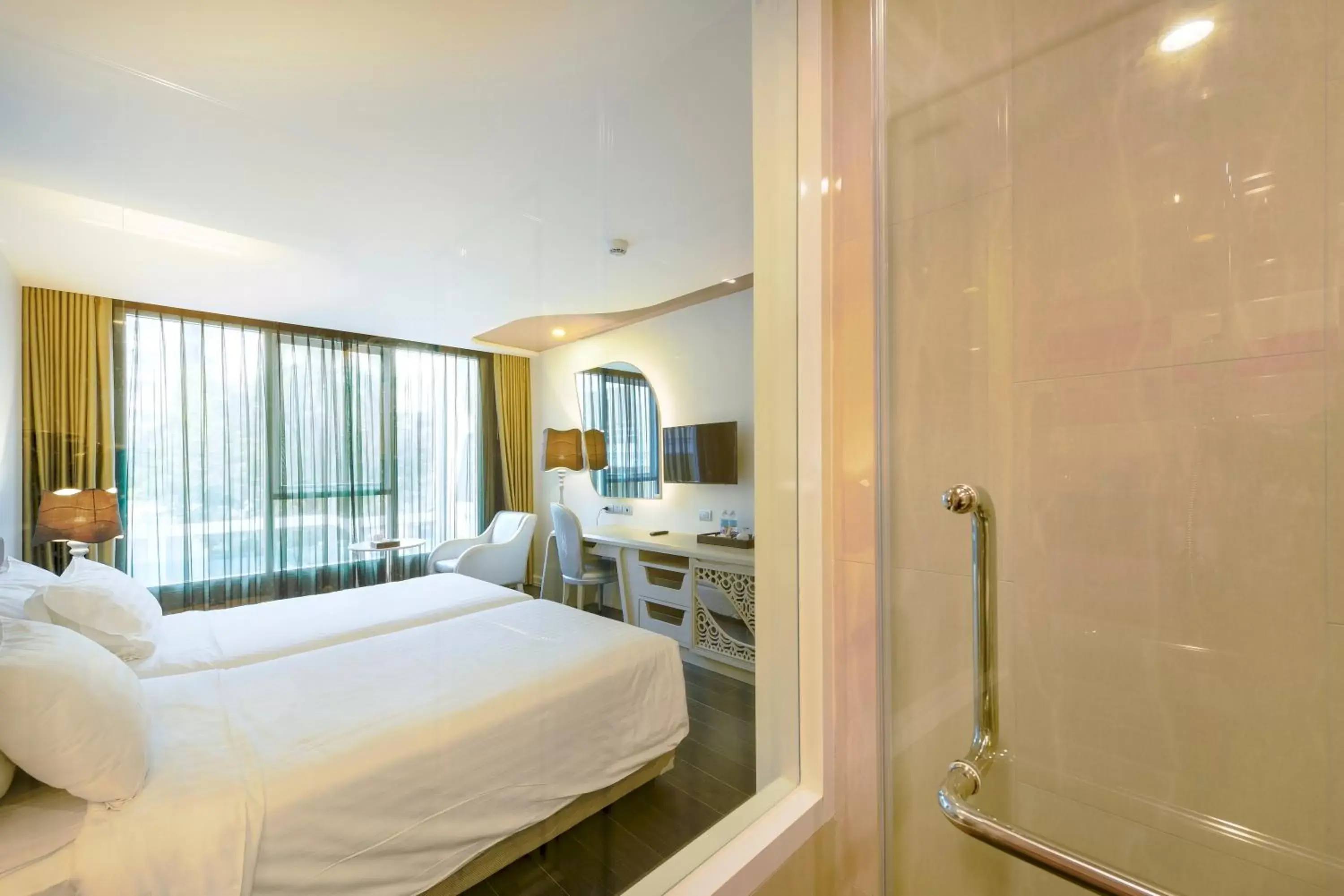 Bedroom in Le Tada Parkview Hotel - SHA Plus